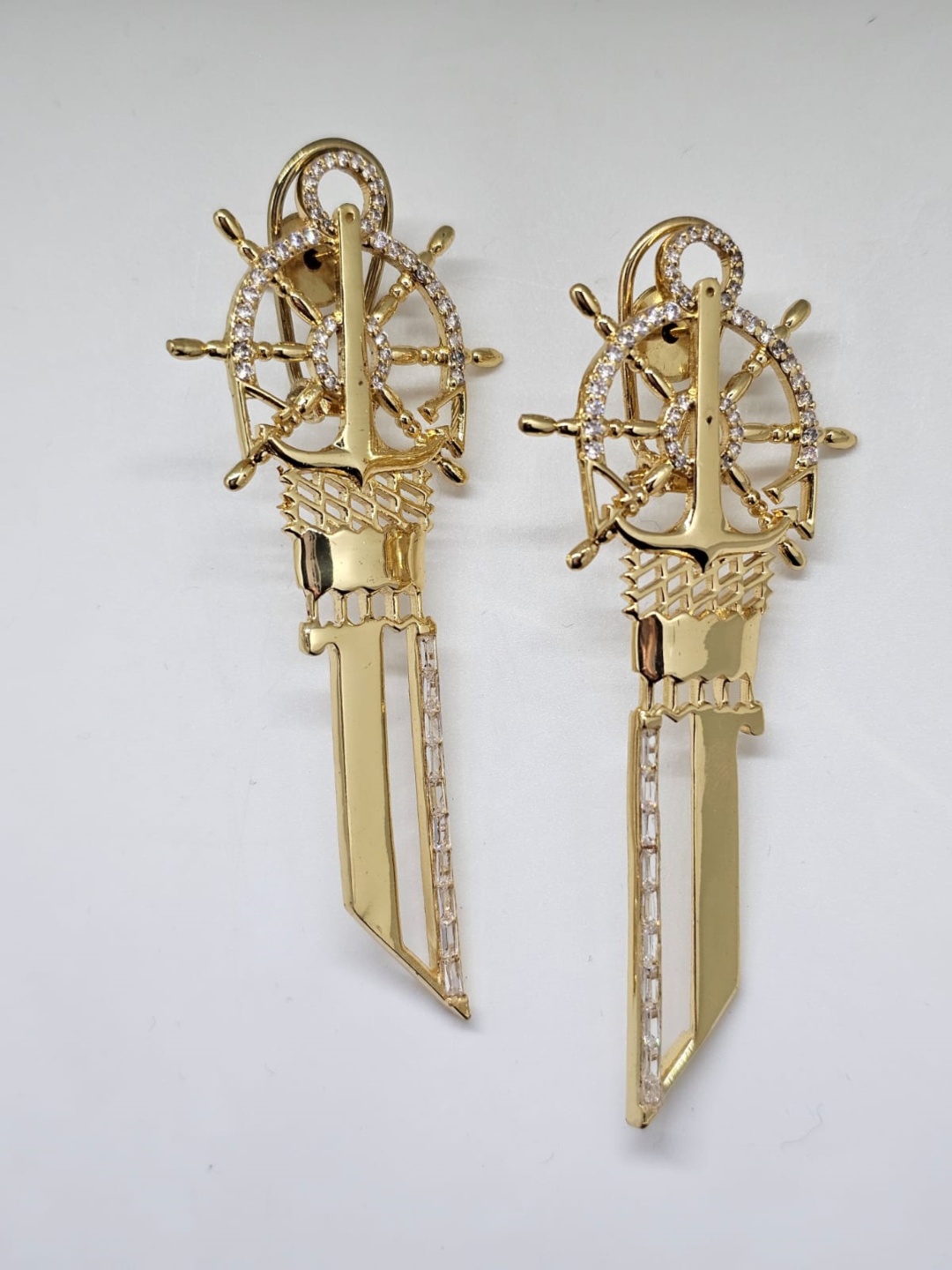 GAURISH BESPOKE JEWELLERY Gold Plated Zircon Stones Studded Contemporary Drop Earrings
GAURISH BESPOKE JEWELLERY Gold Plated Zircon Stones Studded Contemporary Drop Earrings