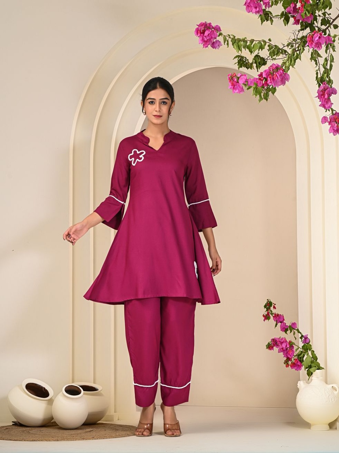 Moda Rapido Women Floral Embroidered Regular Thread Work Kurti with Trousers, Purple
Moda Rapido Women Floral Embroidered Regular Thread Work Kurti with Trousers, Purple