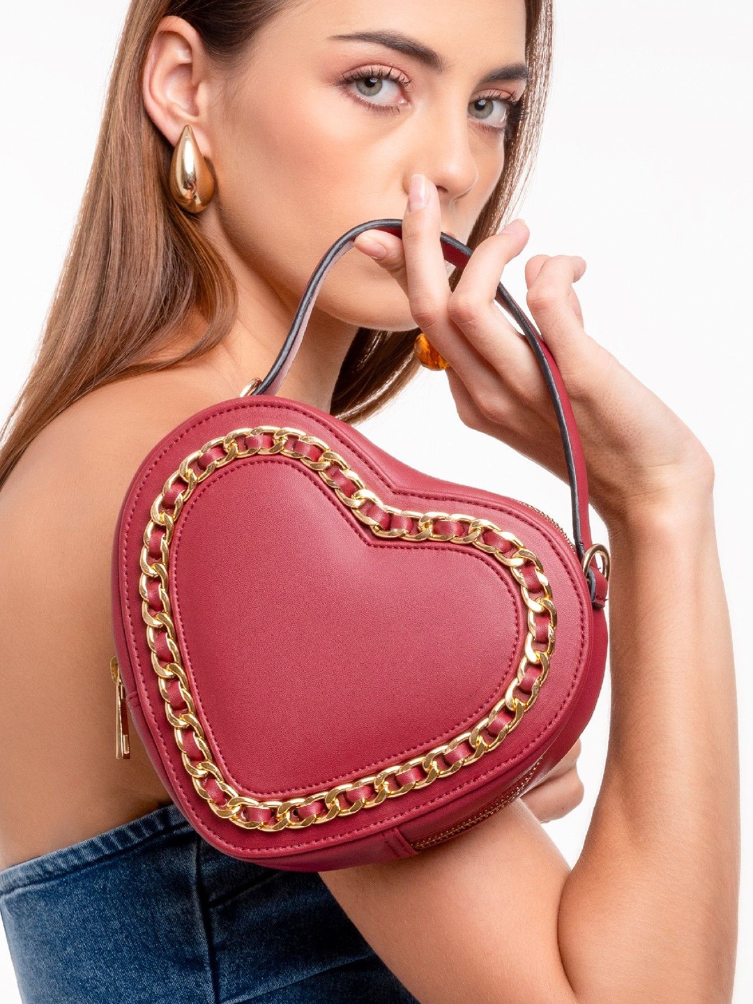 Suave Bags Embellished Cupid Synthetic Leather Cherry Red Half Moon Handheld Bag
Suave Bags Embellished Cupid Synthetic Leather Cherry Red Half Moon Handheld Bag
