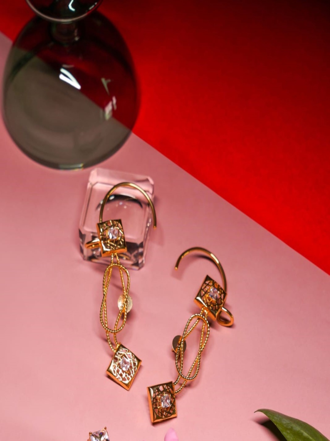 GAURISH BESPOKE JEWELLERY Gold Plated Zircon Stones Studded Contemporary Shaped Earrings
GAURISH BESPOKE JEWELLERY Gold Plated Zircon Stones Studded Contemporary Shaped Earrings