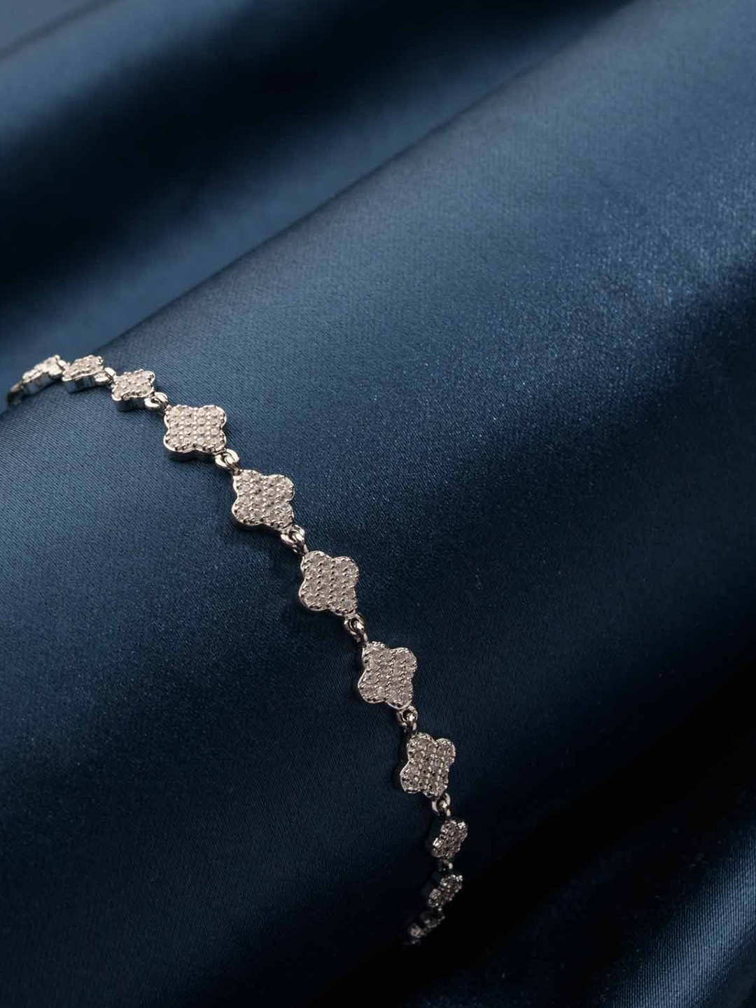Gargi by P. N. Gadgil & Sons 92.5 Sterling Silver Artificial Stones Charm Bracelet
Gargi by P. N. Gadgil & Sons 92.5 Sterling Silver Artificial Stones Charm Bracelet