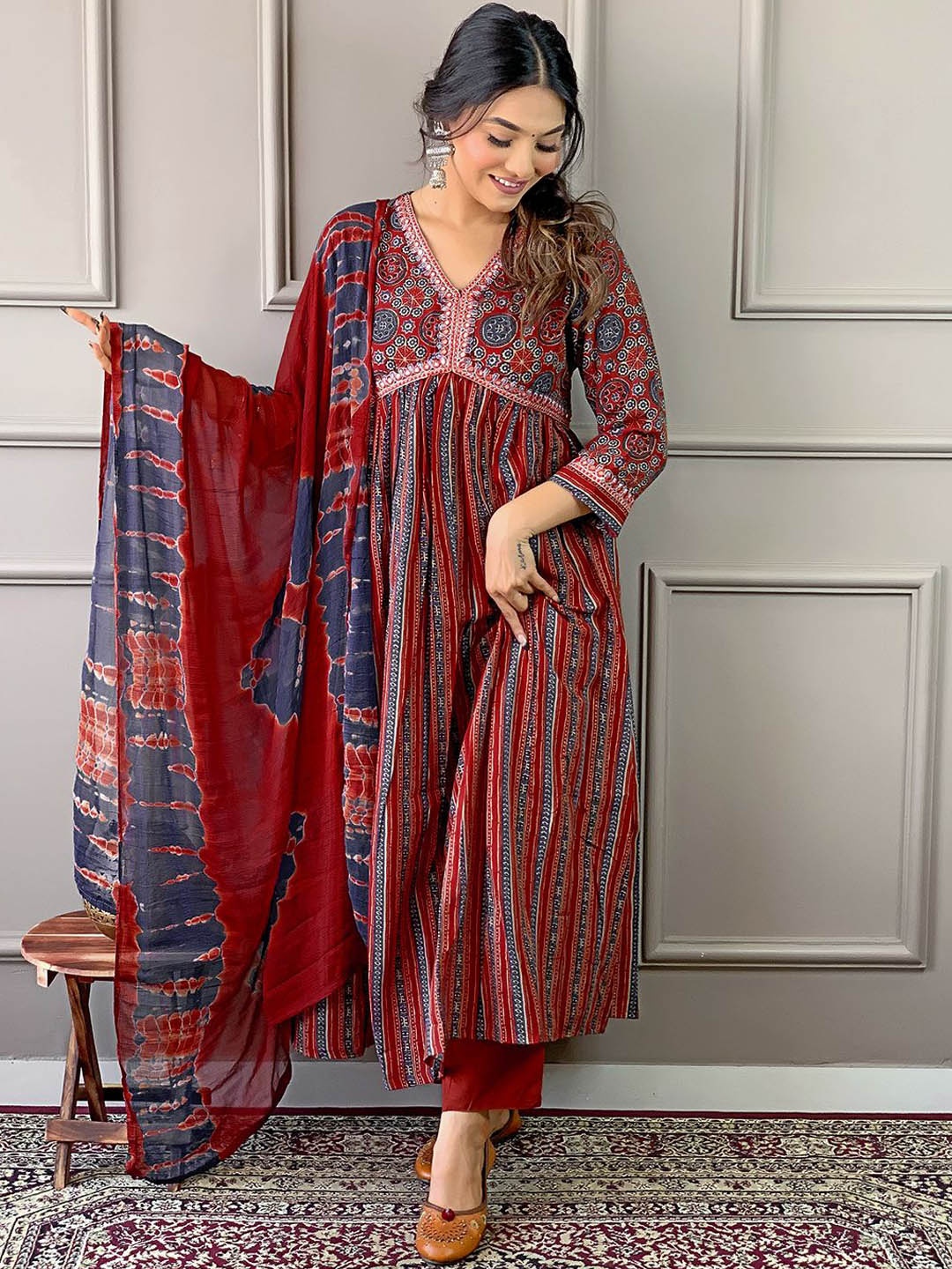 Fashion Care Navlik Floral Printed V-Neck Pleated Anarkali Kurta With Trousers & Dupatta, Maroon
Fashion Care Navlik Floral Printed V-Neck Pleated Anarkali Kurta With Trousers & Dupatta, Maroon