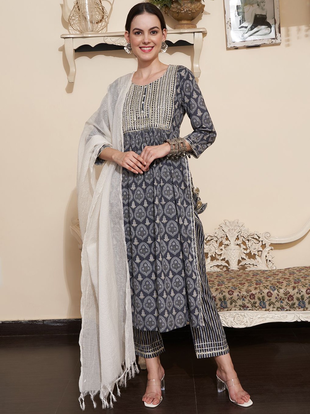 Sangria Grey Floral Printed Gotta Patti Work Pure Cotton Kurta With Trousers And Dupatta
Sangria Grey Floral Printed Gotta Patti Work Pure Cotton Kurta With Trousers And Dupatta