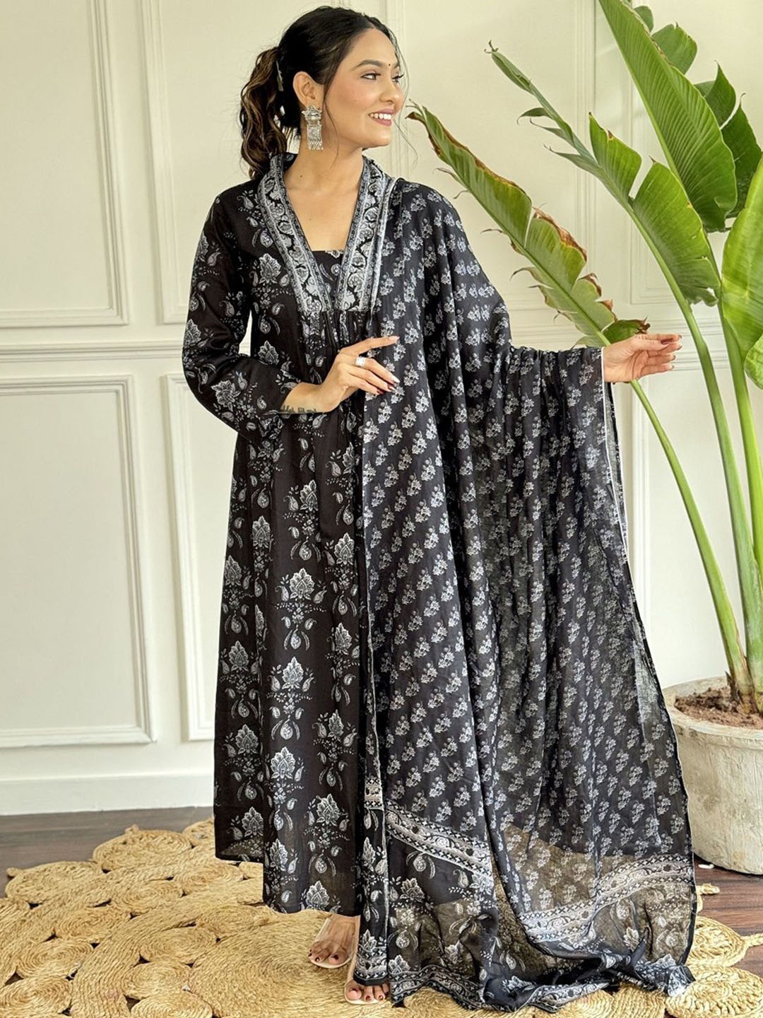 KAUTIK FABRICS Floral Printed V-Neck Organic Cotton A-Line Kurta With Trouser & Dupatta, Black
KAUTIK FABRICS Floral Printed V-Neck Organic Cotton A-Line Kurta With Trouser & Dupatta, Black