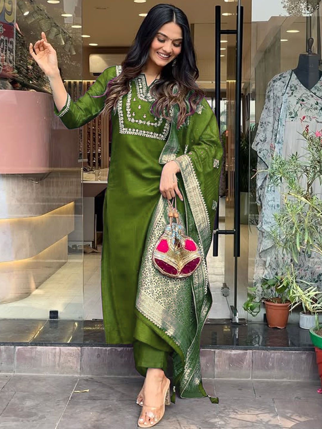 KALINI Floral Embroidered Notch Neck Chanderi Cotton Straight Kurta With Trouser & Dupatta, Olive
KALINI Floral Embroidered Notch Neck Chanderi Cotton Straight Kurta With Trouser & Dupatta, Olive