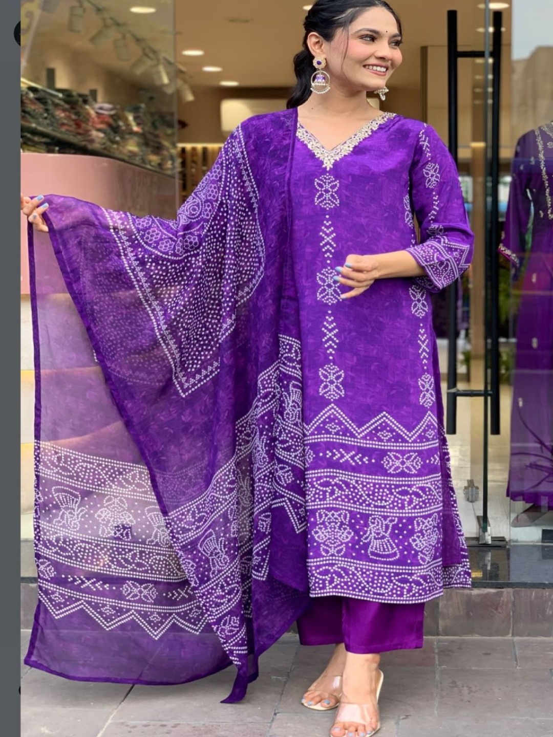 KOTRONS Bandhani Printed V-Neck Zardozi Straight Kurta With Trousers & Dupatta, Purple
KOTRONS Bandhani Printed V-Neck Zardozi Straight Kurta With Trousers & Dupatta, Purple