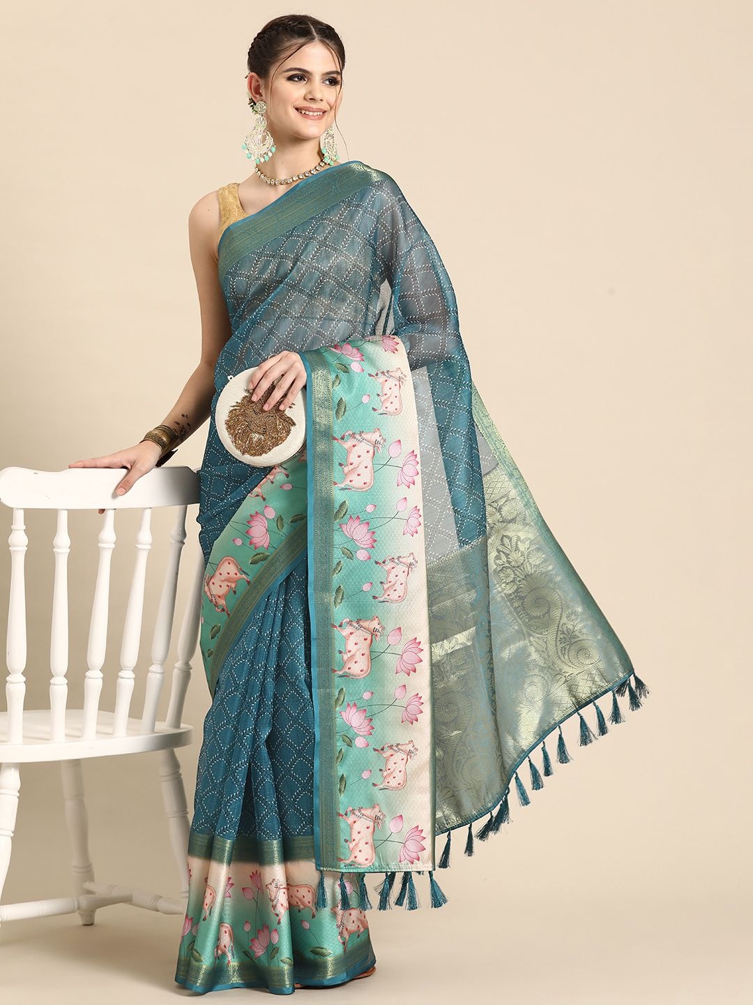 DIVASTRI Kanjivaram Silk Pichwai Digital Printed Saree With Woven Border & Pallu, Teal
DIVASTRI Kanjivaram Silk Pichwai Digital Printed Saree With Woven Border & Pallu, Teal