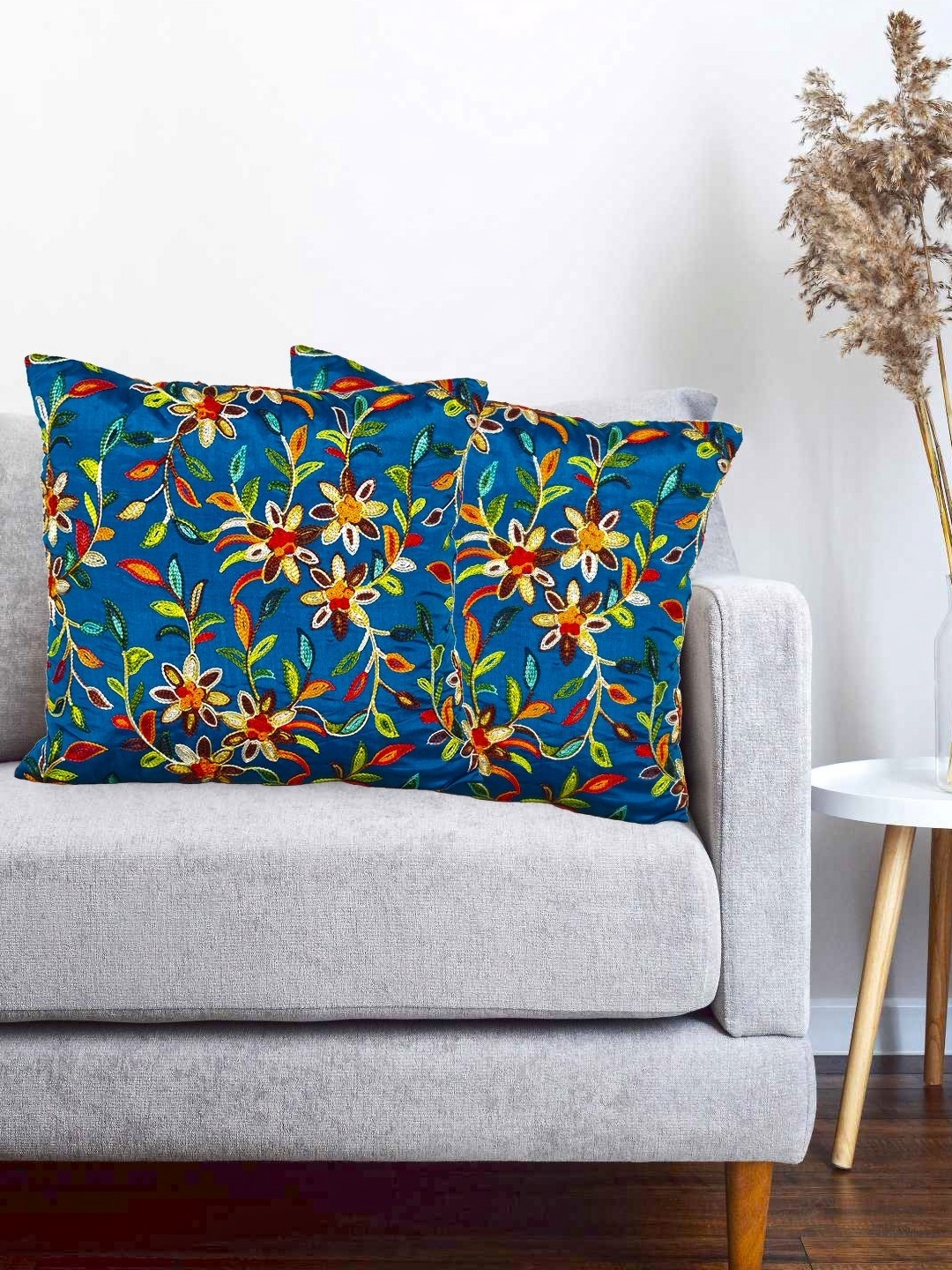 Vinayaka Fab Blue & Yellow 2 Pieces Floral Embroidered Silk Square Shaped Cushion Covers
Vinayaka Fab Blue & Yellow 2 Pieces Floral Embroidered Silk Square Shaped Cushion Covers