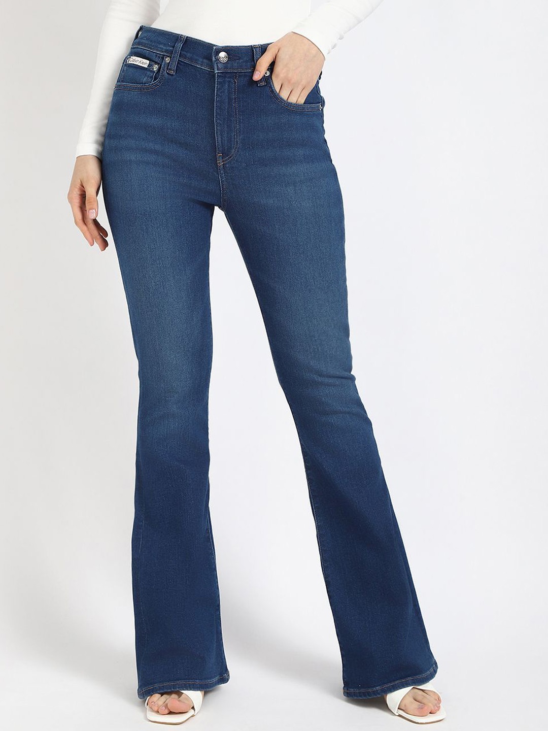 Calvin Klein Women Cotton High-Rise Highly Distressed Light Fade Flared Jeans, Blue
Calvin Klein Women Cotton High-Rise Highly Distressed Light Fade Flared Jeans, Blue