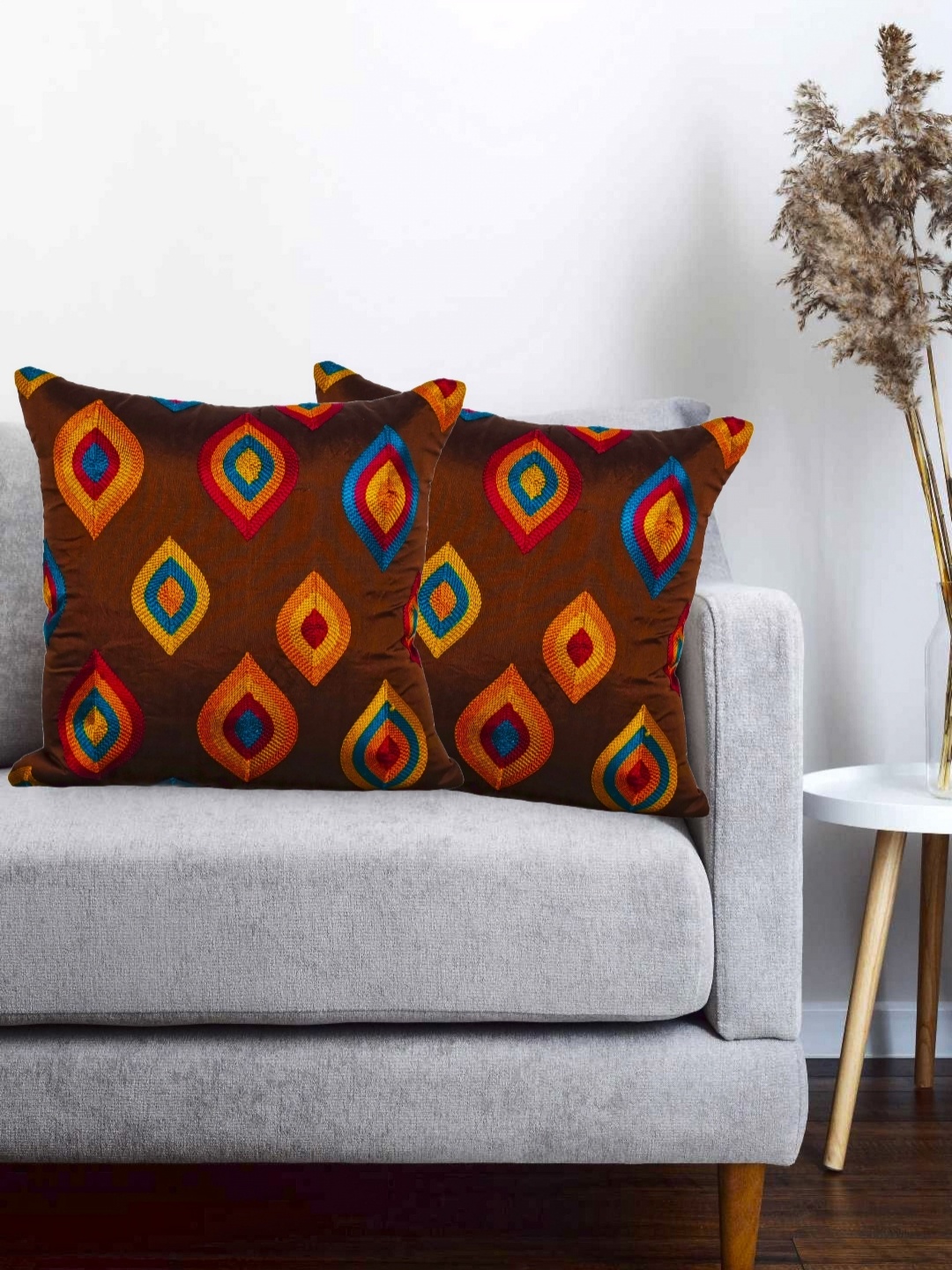 Vinayaka Fab Brown And Blue 2 Pieces Geometric Embroidered Silk Square Cushion Covers
Vinayaka Fab Brown And Blue 2 Pieces Geometric Embroidered Silk Square Cushion Covers