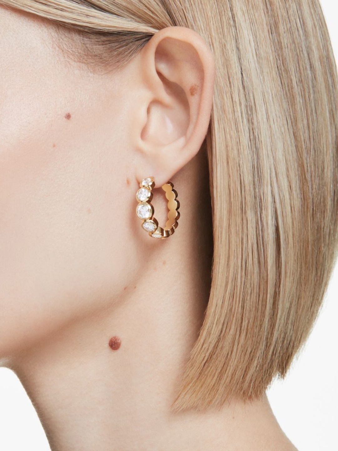 SWAROVSKI Gold-Plated Crystal Stone Studded Circular Shaped Hoop Earrings
SWAROVSKI Gold-Plated Crystal Stone Studded Circular Shaped Hoop Earrings
