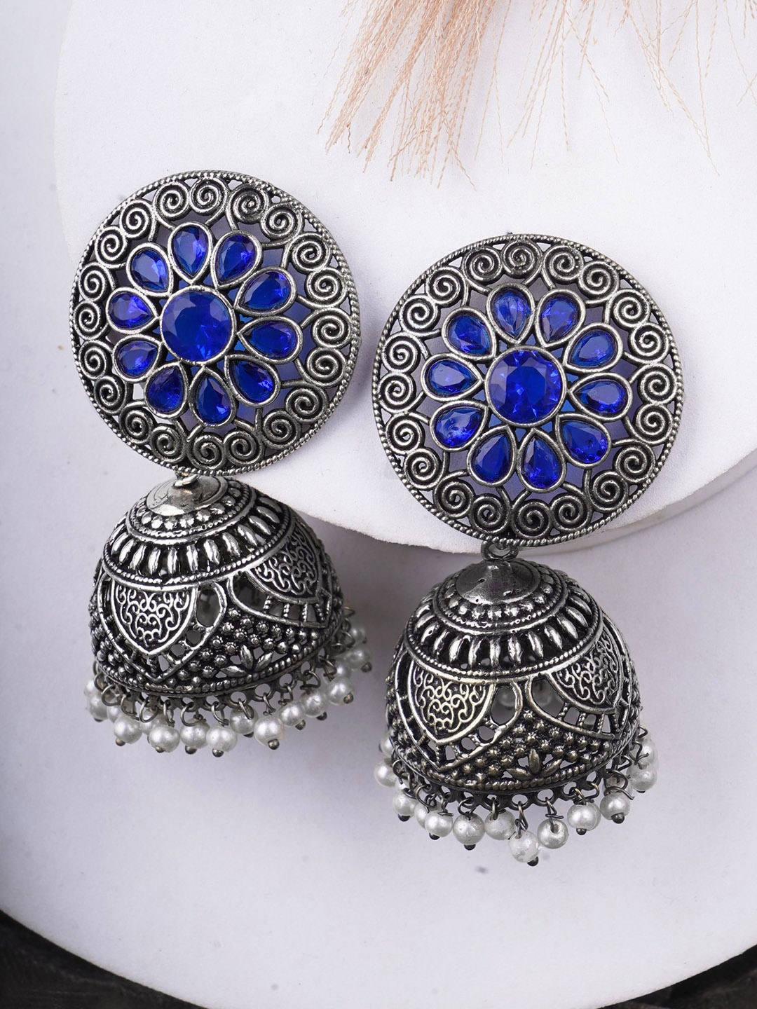 Sangria Blue Silver Plated Oxidised Artificial Stone Studded & Beaded Dome Shaped Jhumkas
Sangria Blue Silver Plated Oxidised Artificial Stone Studded & Beaded Dome Shaped Jhumkas