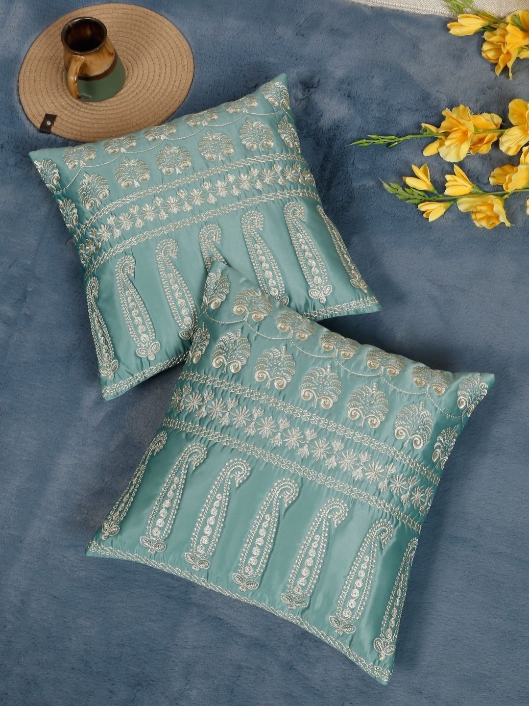 SOKNACK Turquoise Blue & Gold-Toned 2 Pc Ethnic Motifs Embroidered Square Cushion Covers
SOKNACK Turquoise Blue & Gold-Toned 2 Pc Ethnic Motifs Embroidered Square Cushion Covers