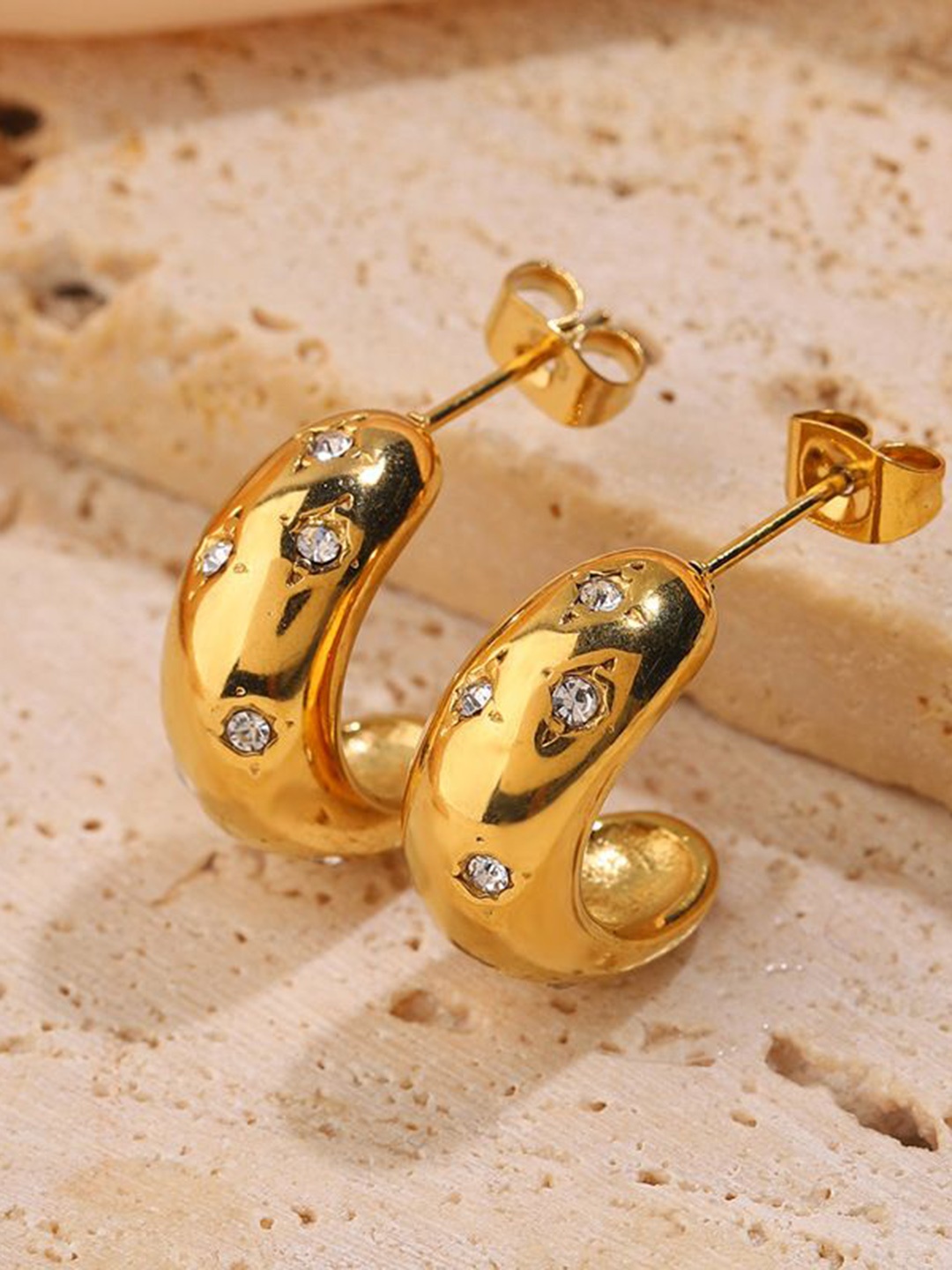 MEENAZ Gold-Plated Stainless Steel Contemporary Artifial Stones Studded Half Hoop Earrings
MEENAZ Gold-Plated Stainless Steel Contemporary Artifial Stones Studded Half Hoop Earrings