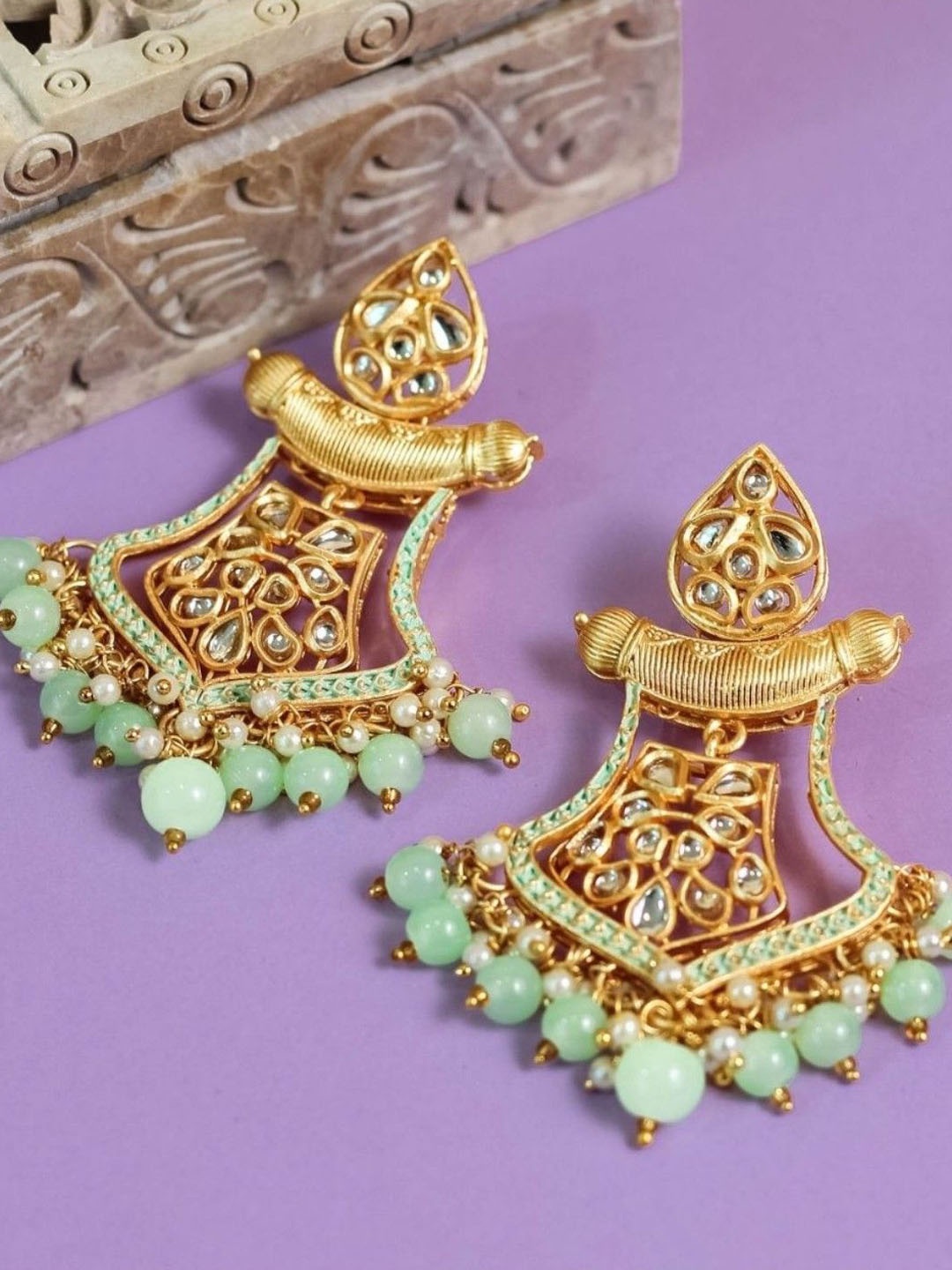 Anouk Gold-Plated Artificial Beaded And Kundan Studded Contemporary Shaped Drop Earrings
Anouk Gold-Plated Artificial Beaded And Kundan Studded Contemporary Shaped Drop Earrings
