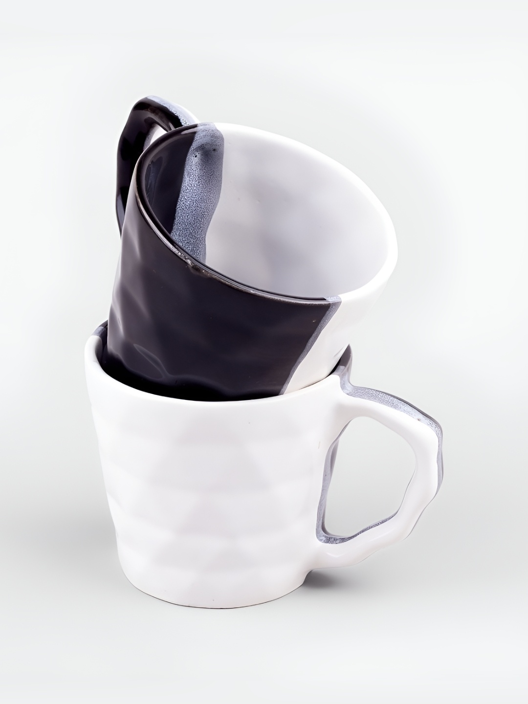 Storepedia Black & White Handcrafted Textured Ceramic Glossy Cups Set of Cups and Mugs
Storepedia Black & White Handcrafted Textured Ceramic Glossy Cups Set of Cups and Mugs