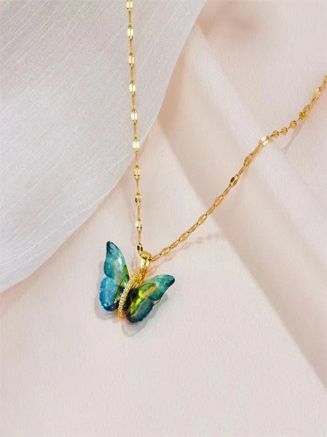 DressBerry Gold-Plated Animal Shaped Artificial Stones studded & Beaded Pendant With Chain
DressBerry Gold-Plated Animal Shaped Artificial Stones studded & Beaded Pendant With Chain