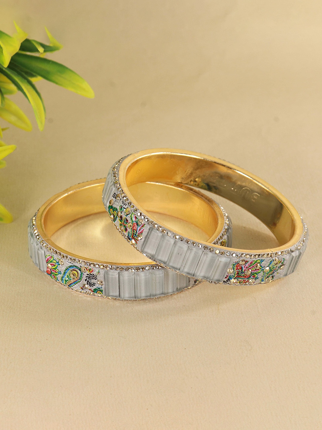 ZULKA Set of 2 Zircon Diamond & Crystal Studded Floral Printed Metal Kada Bangles, Grey
ZULKA Set of 2 Zircon Diamond & Crystal Studded Floral Printed Metal Kada Bangles, Grey