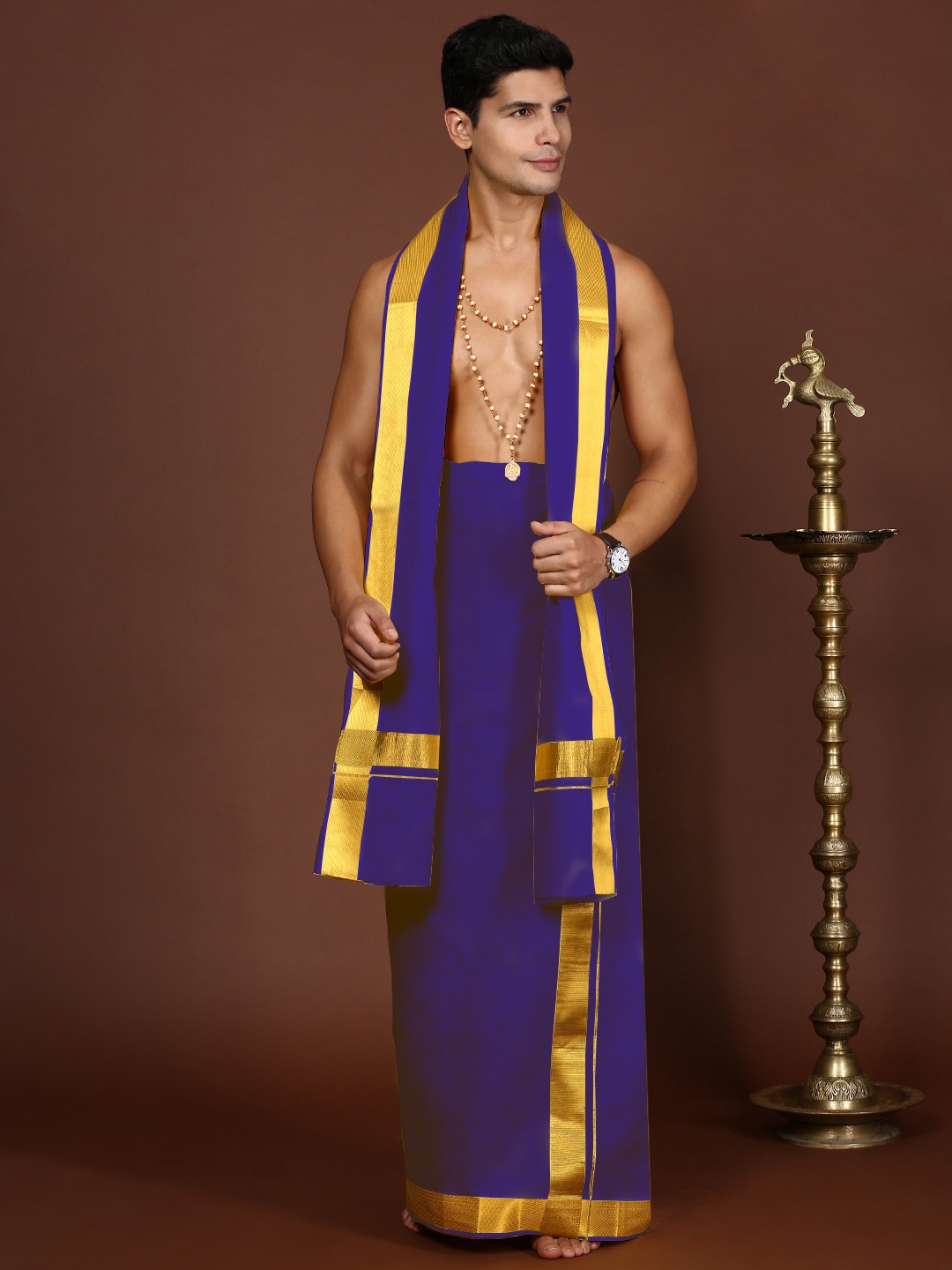 Devala Weavers Society Men Cotton Double Layer Purple Dhotis & Angavastram Set with Zari Border
Devala Weavers Society Men Cotton Double Layer Purple Dhotis & Angavastram Set with Zari Border