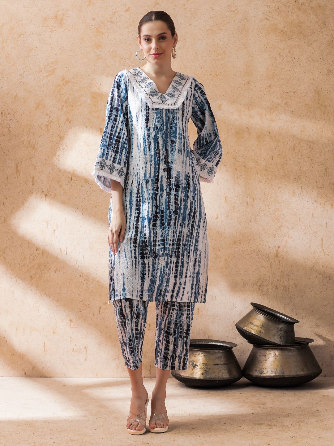 STYLEBAAZI Shibori Printed Bell Sleeves V-Neck Thread Work A-Line Kurta With Trouser, Teal
STYLEBAAZI Shibori Printed Bell Sleeves V-Neck Thread Work A-Line Kurta With Trouser, Teal