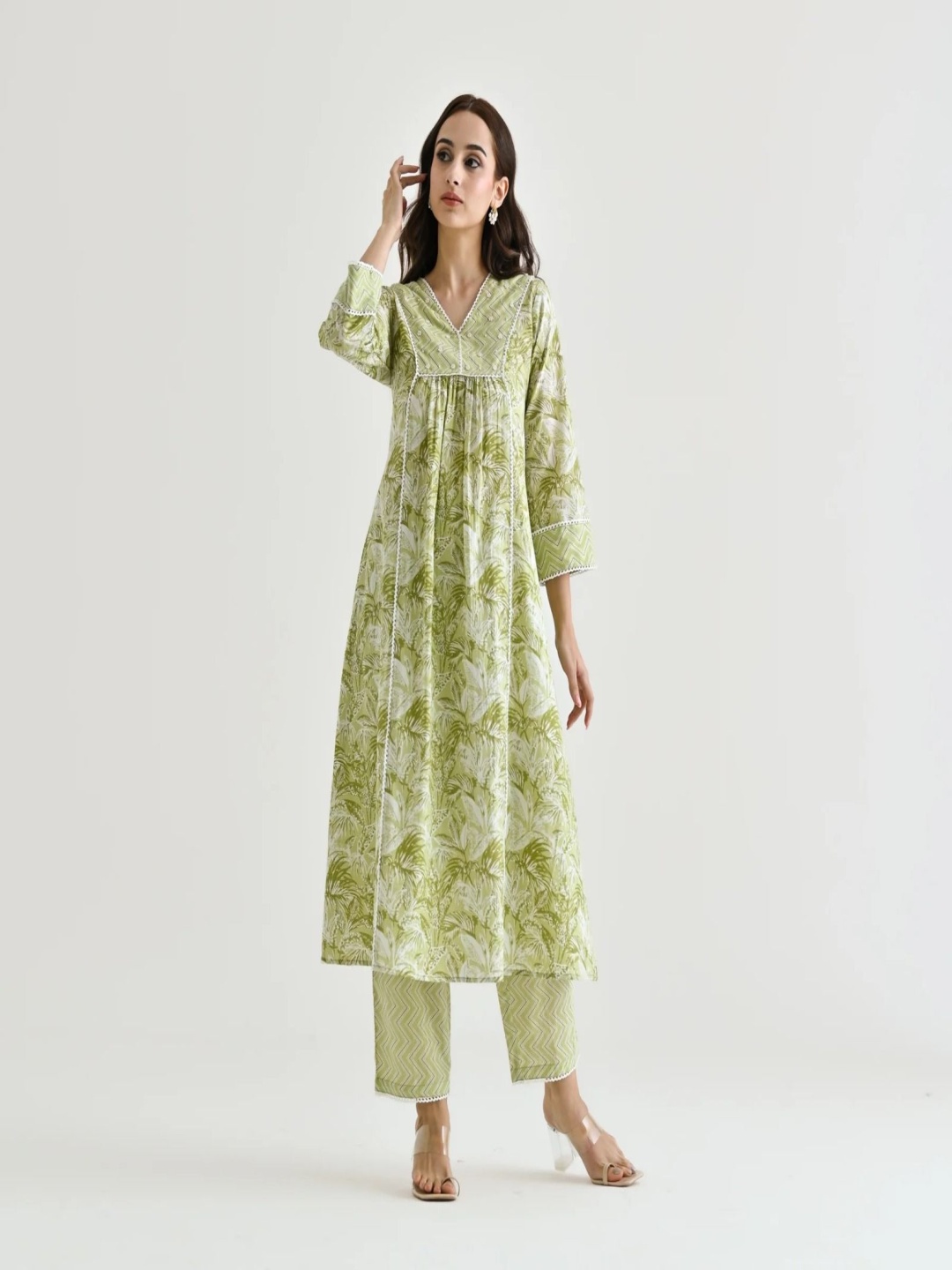 KALINI Floral Printed V-Neck Beads and Stones Pleated A-line Kurta With Trousers & Dupatta, Green
KALINI Floral Printed V-Neck Beads and Stones Pleated A-line Kurta With Trousers & Dupatta, Green