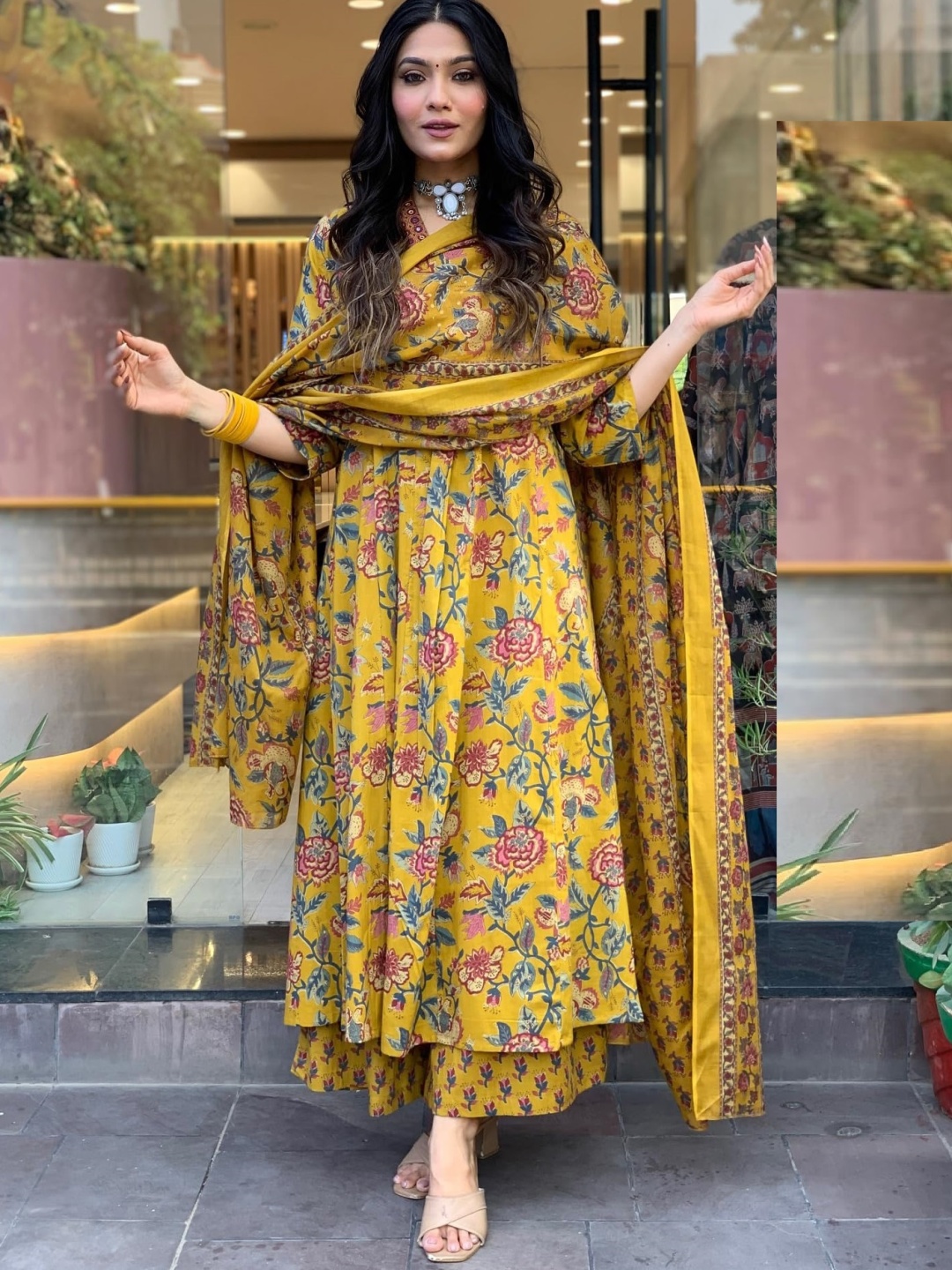 KALINI Floral Printed V-Neck Pleated A-Line Kurta With Palazzo And Dupatta, Yellow
KALINI Floral Printed V-Neck Pleated A-Line Kurta With Palazzo And Dupatta, Yellow
