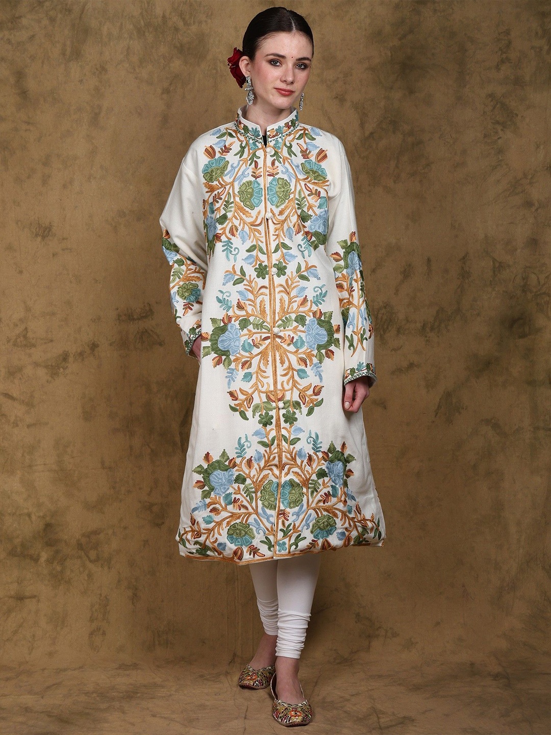 Exotic India Wool Long Kashmiri Jacket with Multicolor Aari Embroidered Floral Motifs, White
Exotic India Wool Long Kashmiri Jacket with Multicolor Aari Embroidered Floral Motifs, White