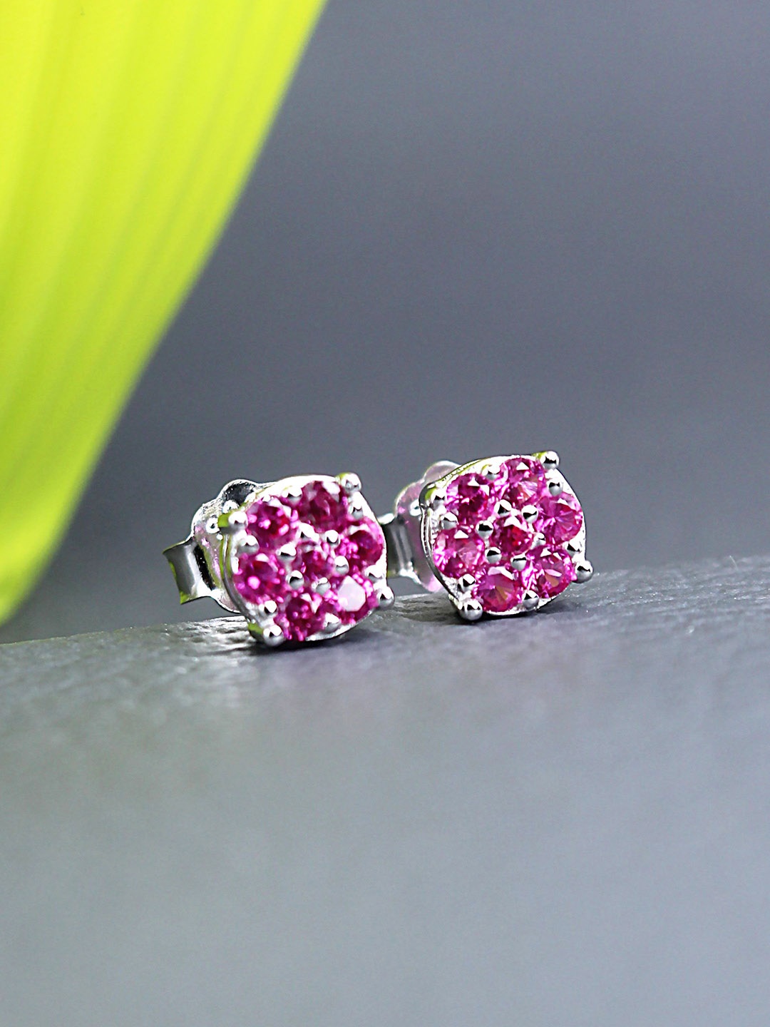 DEVASHREE 925 Silver Rhodium-Plated Ruby Cubic Zirconia Studded Floral Shaped Studs, Red
DEVASHREE 925 Silver Rhodium-Plated Ruby Cubic Zirconia Studded Floral Shaped Studs, Red