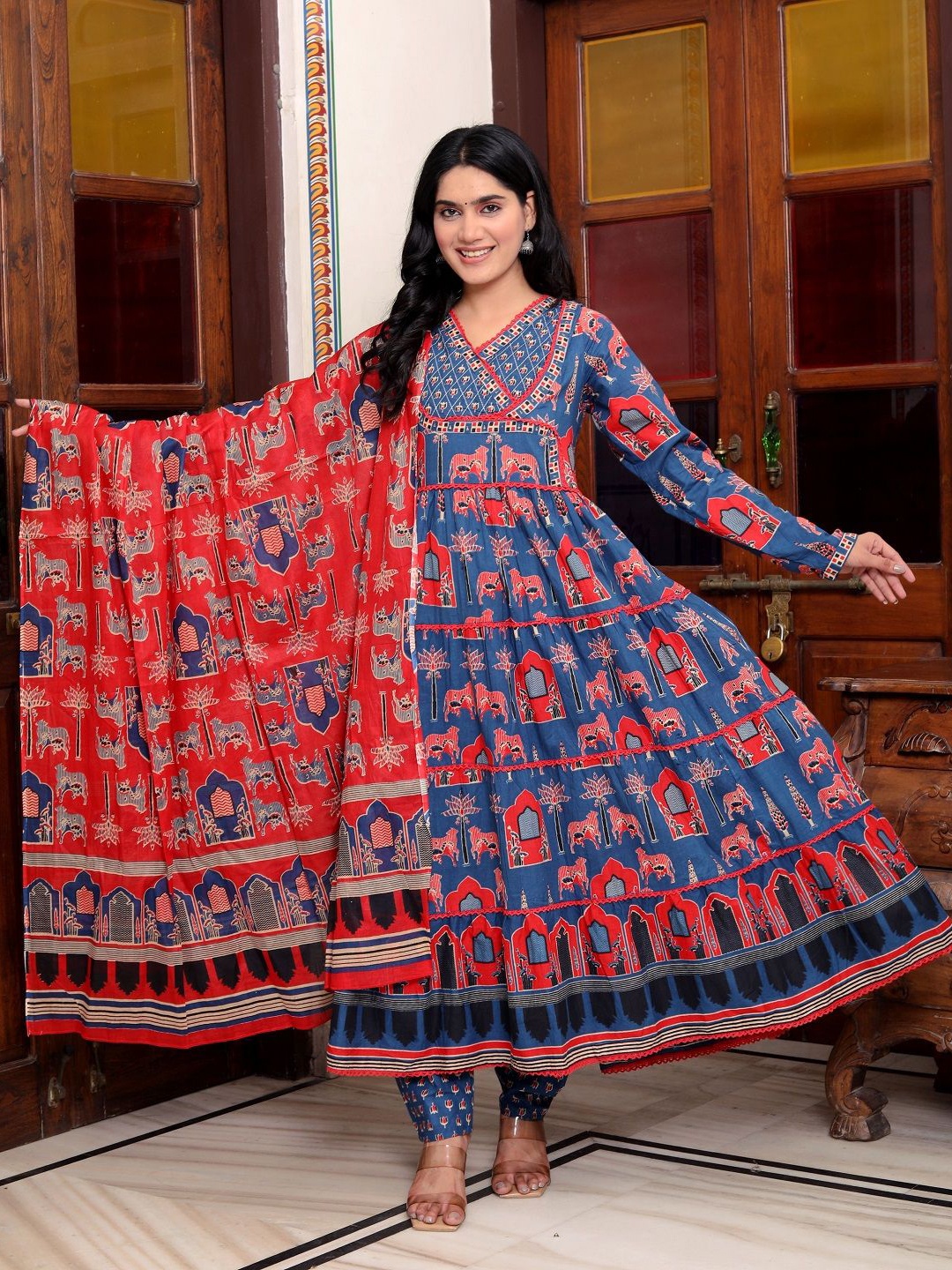 KALINI Animal Printed V-Neck Anarkali Pure Cotton Kurta With Trousers And Dupatta, Blue
KALINI Animal Printed V-Neck Anarkali Pure Cotton Kurta With Trousers And Dupatta, Blue
