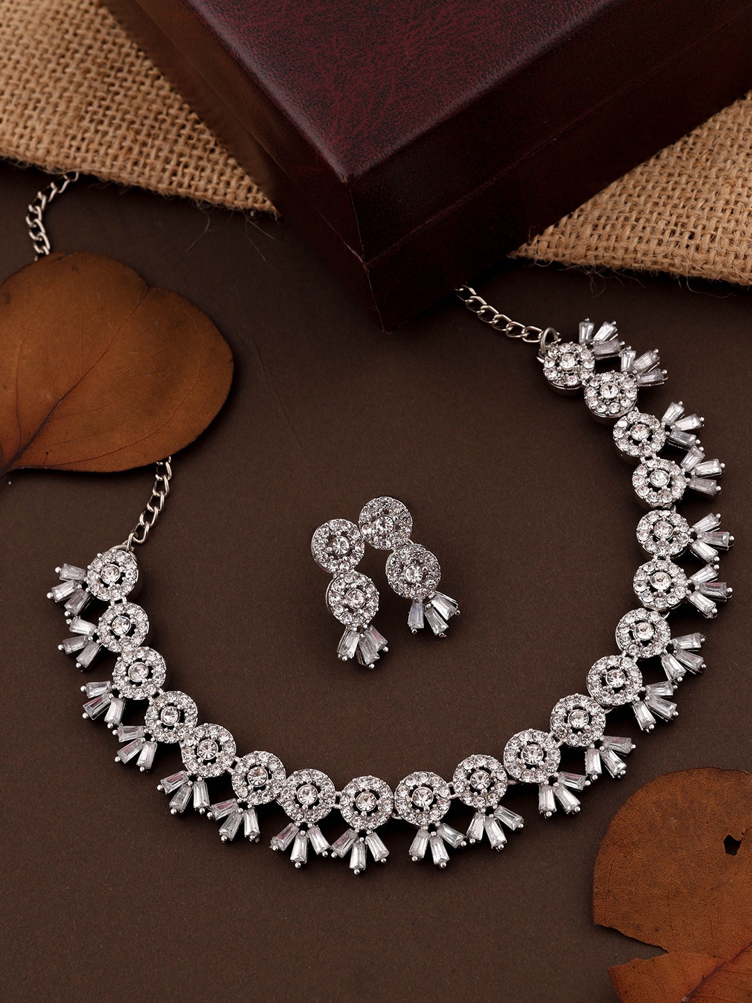 DIVASTRI Set Of 2 Gold Plated & Silver Plated American Diamond Studded Jewellery Set
DIVASTRI Set Of 2 Gold Plated & Silver Plated American Diamond Studded Jewellery Set