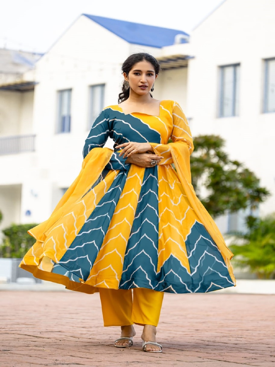 KALINI Geometric Printed Square Neck Panelled Anarkali Kurta with Trousers & Dupatta, Yellow
KALINI Geometric Printed Square Neck Panelled Anarkali Kurta with Trousers & Dupatta, Yellow