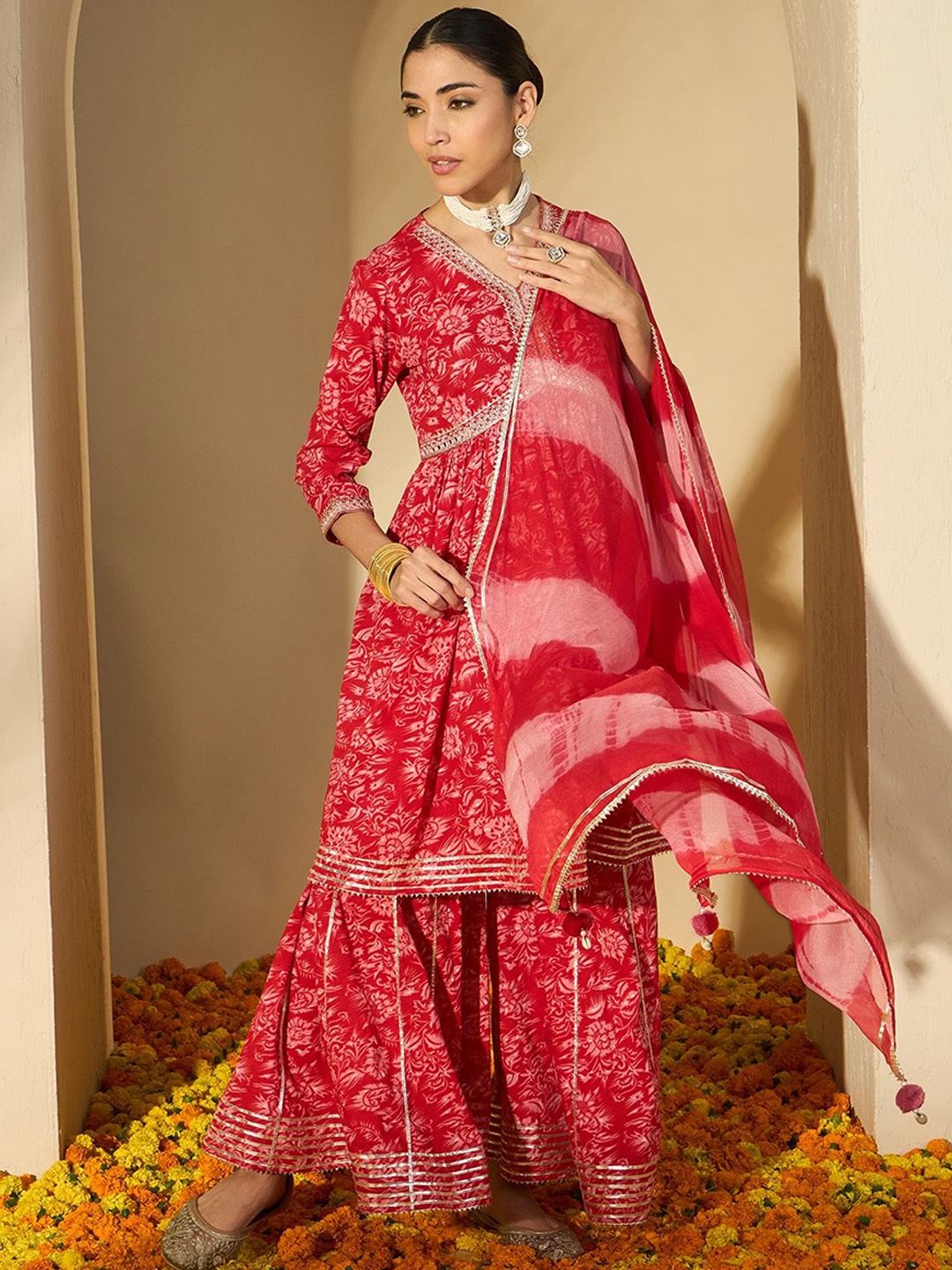 BANDIA Women Printed Empire Mirror Work Pure Cotton Kurta with Sharara & With Dupatta, Red
BANDIA Women Printed Empire Mirror Work Pure Cotton Kurta with Sharara & With Dupatta, Red