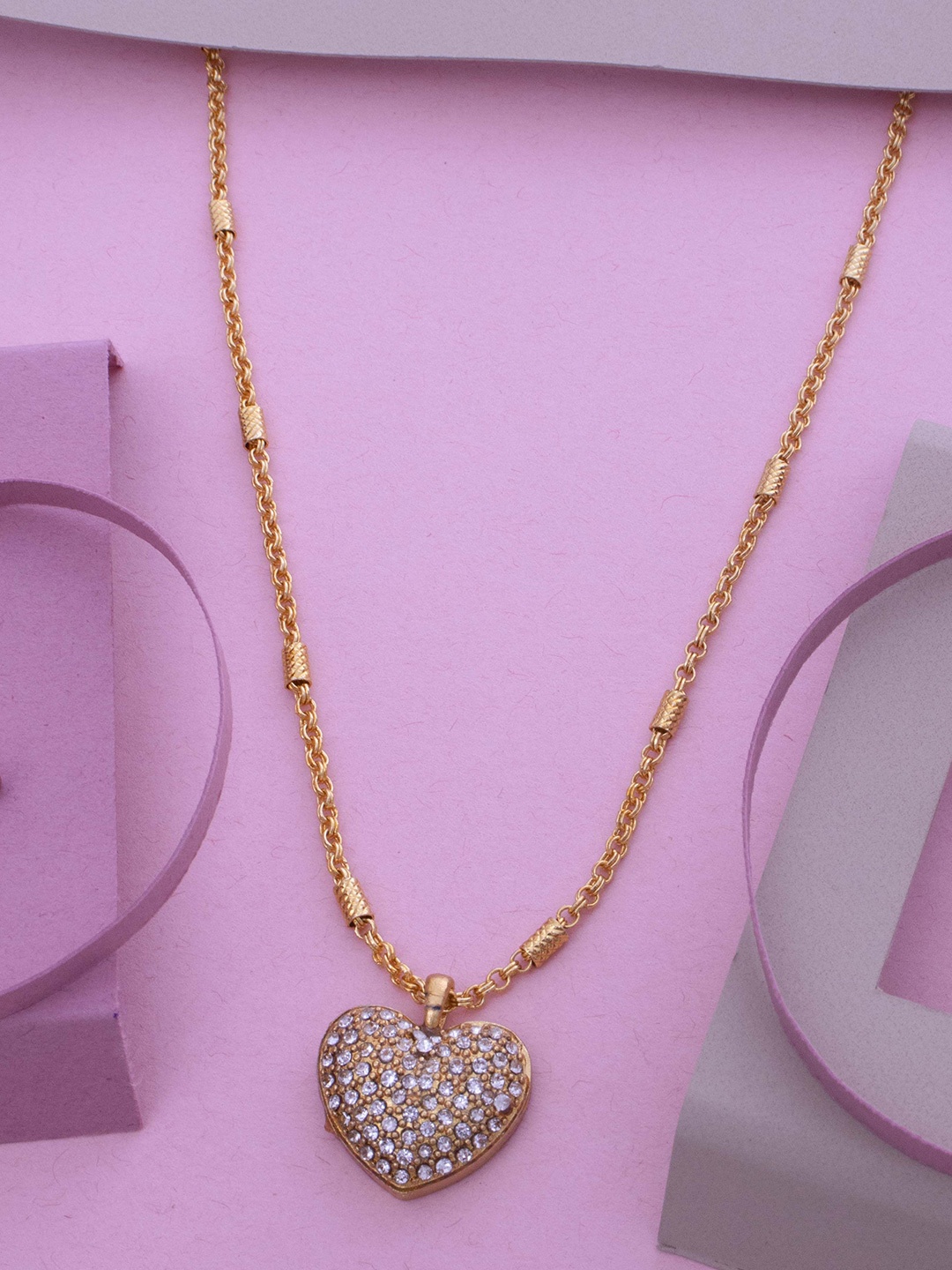Ramdev Art Fashion Jwellery Gold-Plated Stone Studded Heart Shaped Pendant With Chain
Ramdev Art Fashion Jwellery Gold-Plated Stone Studded Heart Shaped Pendant With Chain