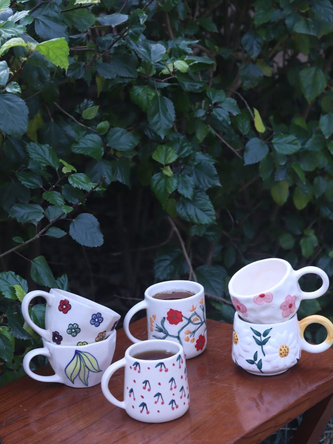 WEAVING HOMES Sip & Shine White & Green 6 Pcs Floral Printed Ceramic Glossy Mugs 230ml
WEAVING HOMES Sip & Shine White & Green 6 Pcs Floral Printed Ceramic Glossy Mugs 230ml