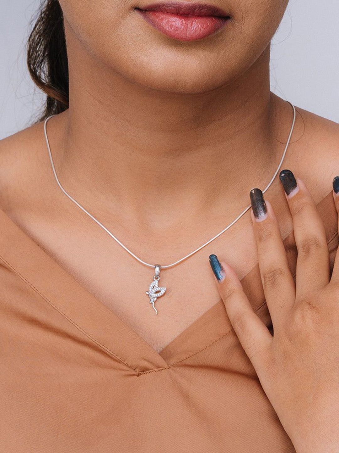 Ruhaani Sterling Silver Rhodium-Plated Cubic Zirconia Charlotte Fairy Pendant With Chain
Ruhaani Sterling Silver Rhodium-Plated Cubic Zirconia Charlotte Fairy Pendant With Chain