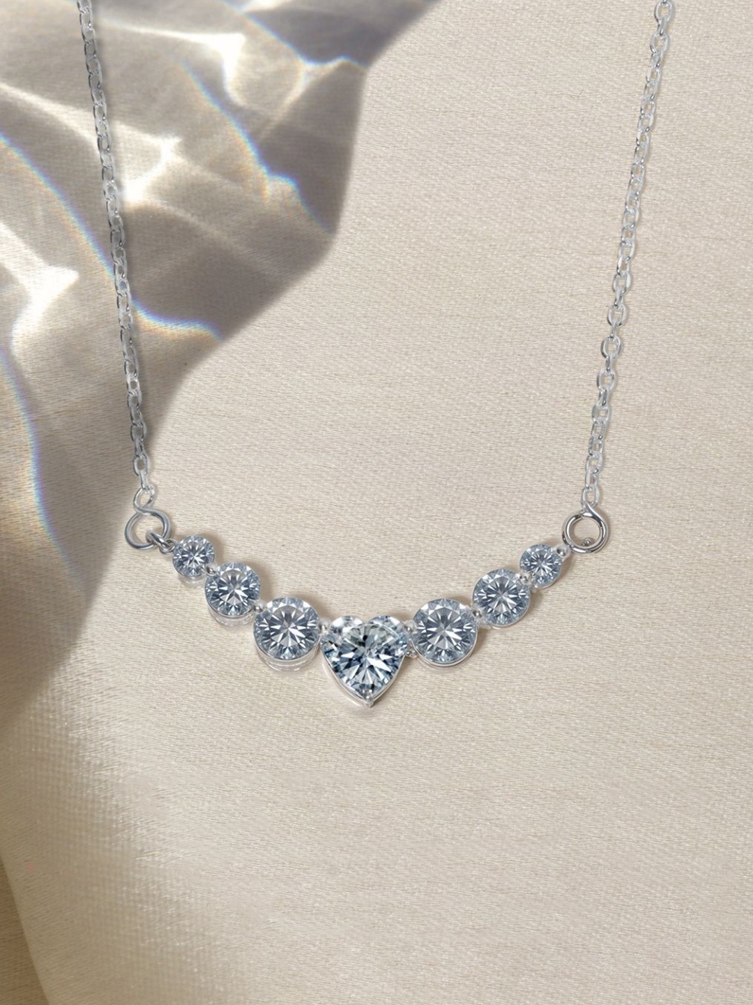 HighSpark 92.5 Sterling Silver Cubic Zirconia Hearty Constellation Solitaire Chain
HighSpark 92.5 Sterling Silver Cubic Zirconia Hearty Constellation Solitaire Chain
