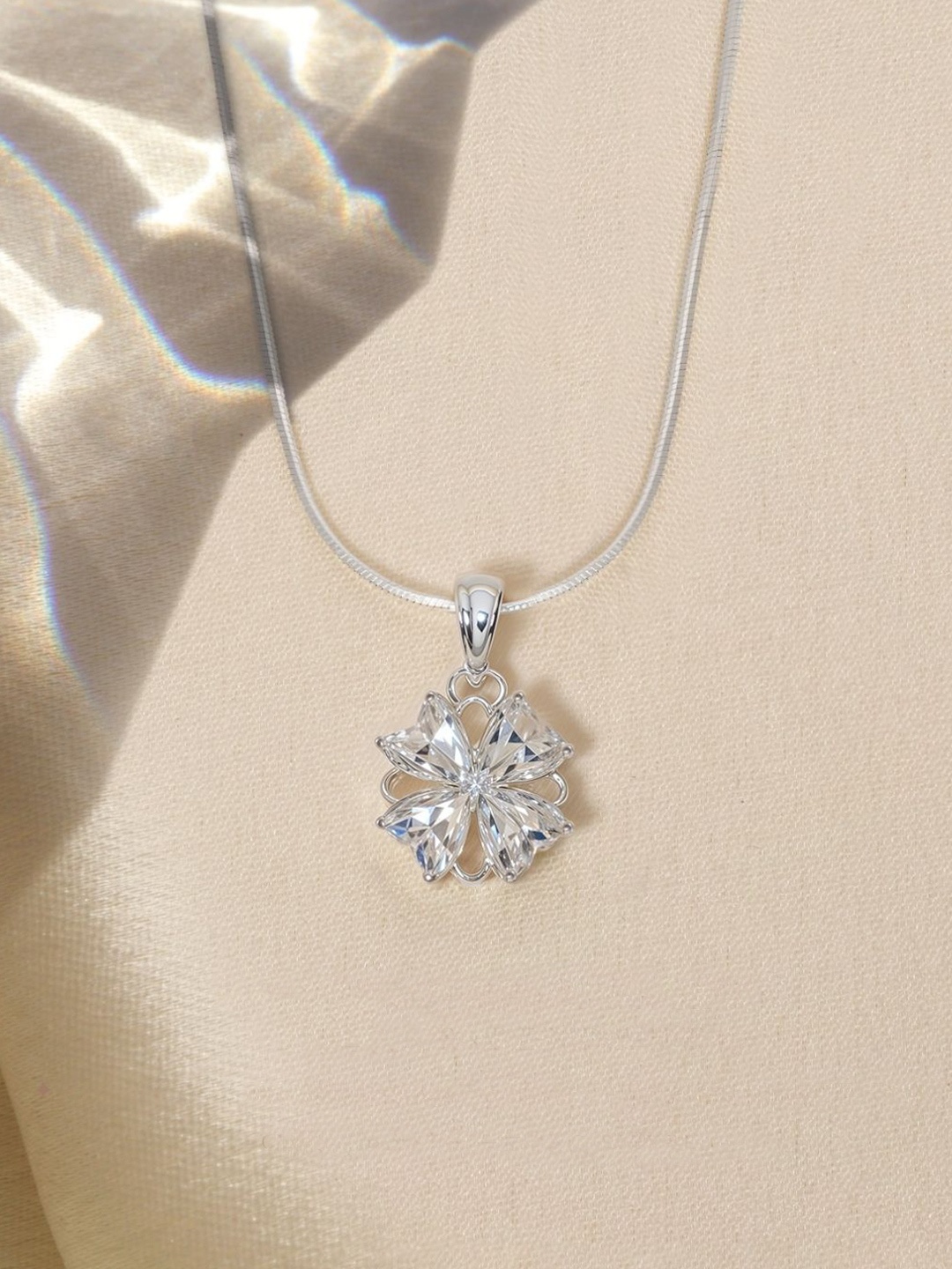 HighSpark 92.5 Sterling Silver CZ Studded Dazzling Petunia Solitaire Pendant & Chain
HighSpark 92.5 Sterling Silver CZ Studded Dazzling Petunia Solitaire Pendant & Chain