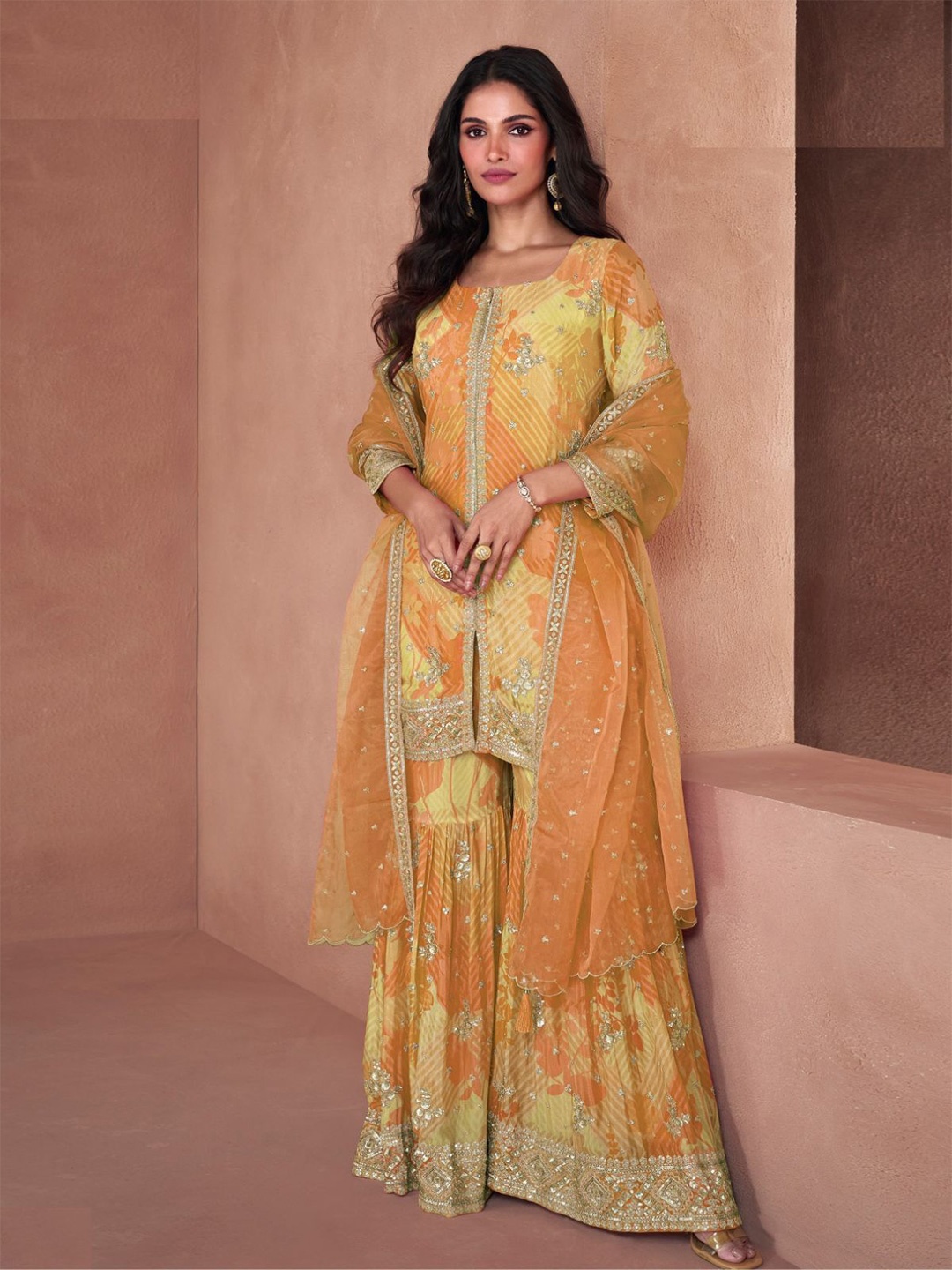 ODETTE Women Embroidered Floral Regular Sequinned Kurta with Sharara & Dupatta, Mustard
ODETTE Women Embroidered Floral Regular Sequinned Kurta with Sharara & Dupatta, Mustard