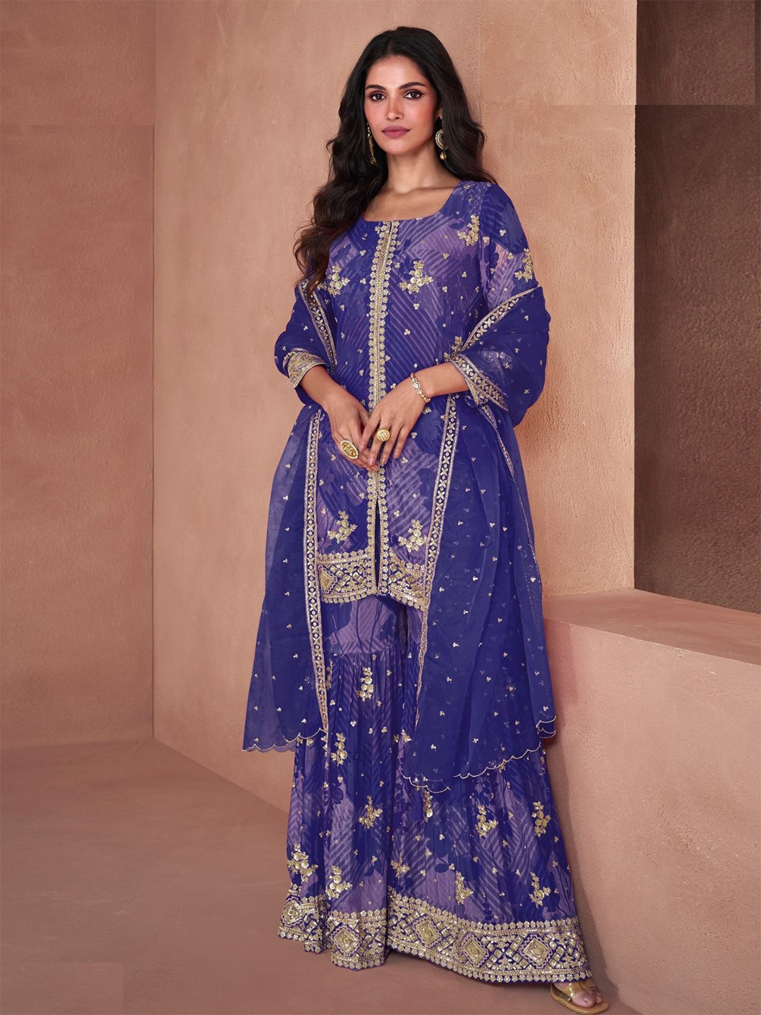 ODETTE Women Embroidered Floral Regular Sequinned Kurta with Sharara & With Dupatta, Purple
ODETTE Women Embroidered Floral Regular Sequinned Kurta with Sharara & With Dupatta, Purple