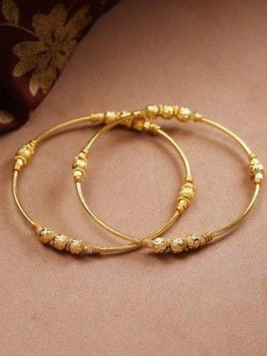 TSF JEWELLERY Set Of 2 Gold Plated Bangles
TSF JEWELLERY Set Of 2 Gold Plated Bangles