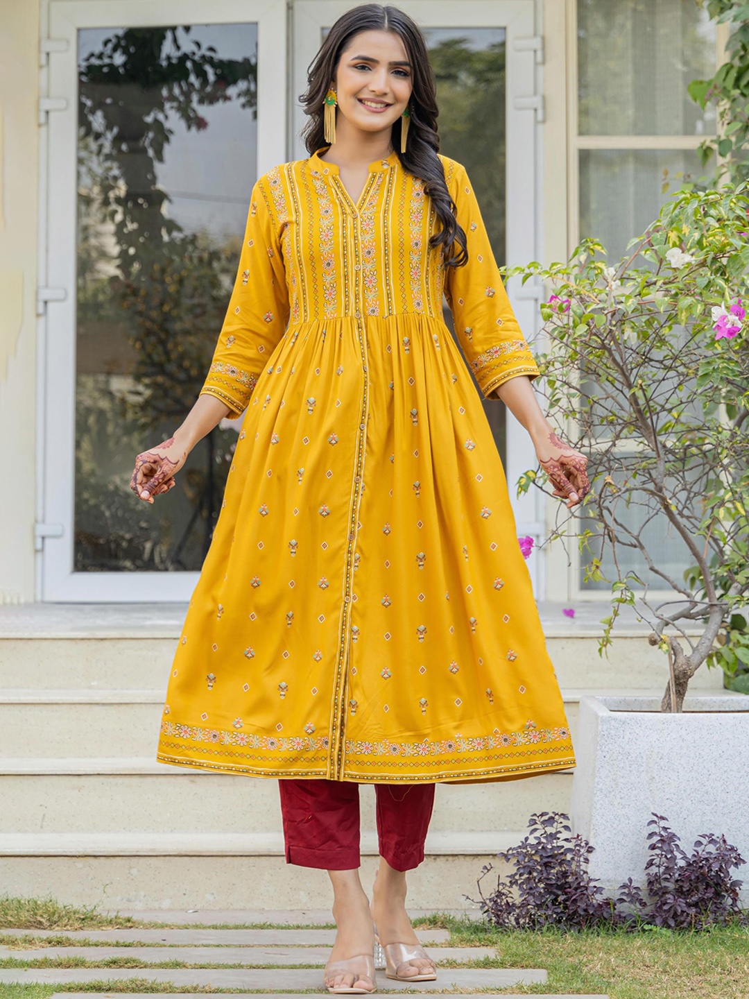 Juniper Women Floral Printed Flared Sleeves Thread Work Liva Kurta, Mustard
Juniper Women Floral Printed Flared Sleeves Thread Work Liva Kurta, Mustard
