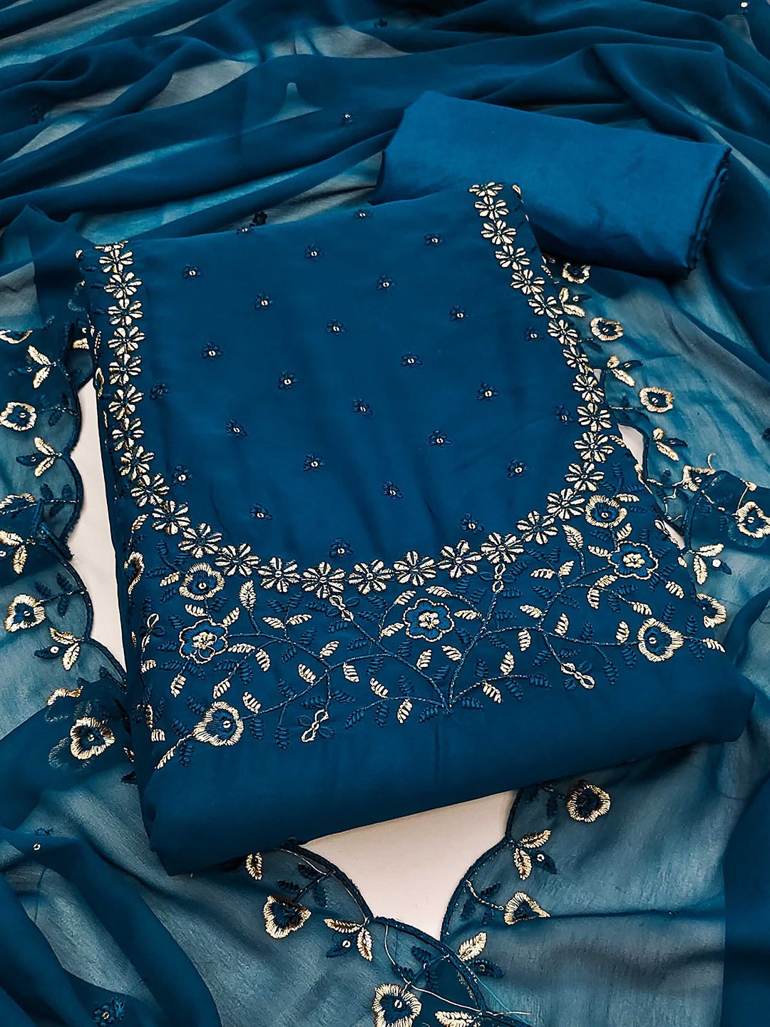 SHADOW & SAINING Floral Embroidered Sequinned Silk Georgette Unstitched Dress Material, Blue
SHADOW & SAINING Floral Embroidered Sequinned Silk Georgette Unstitched Dress Material, Blue