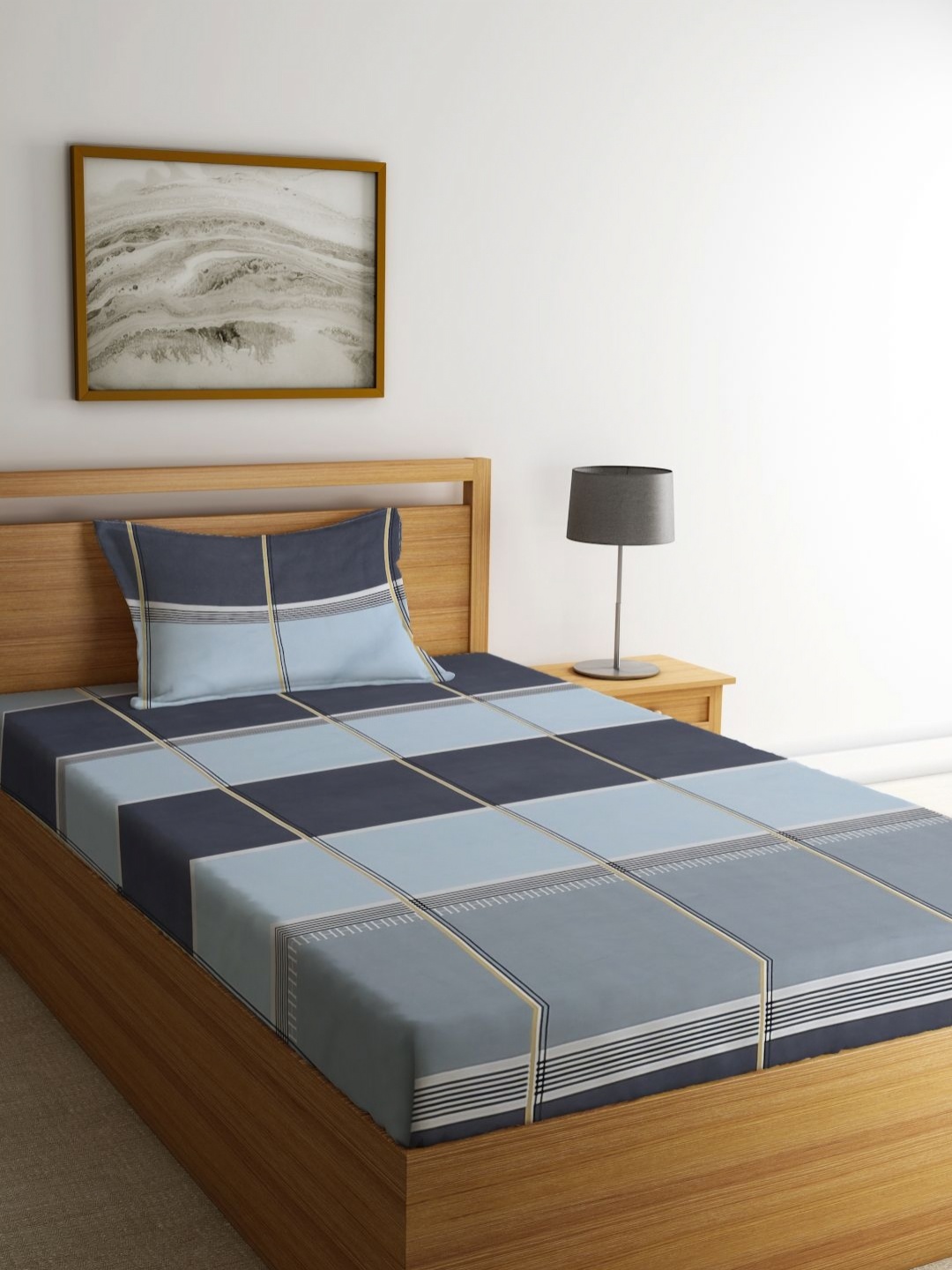 Myntra Elegant Homes Blue & Navy Blue Geometric 300 TC Single Bedsheet Set 2.5 m x 1.5 m
Myntra Elegant Homes Blue & Navy Blue Geometric 300 TC Single Bedsheet Set 2.5 m x 1.5 m