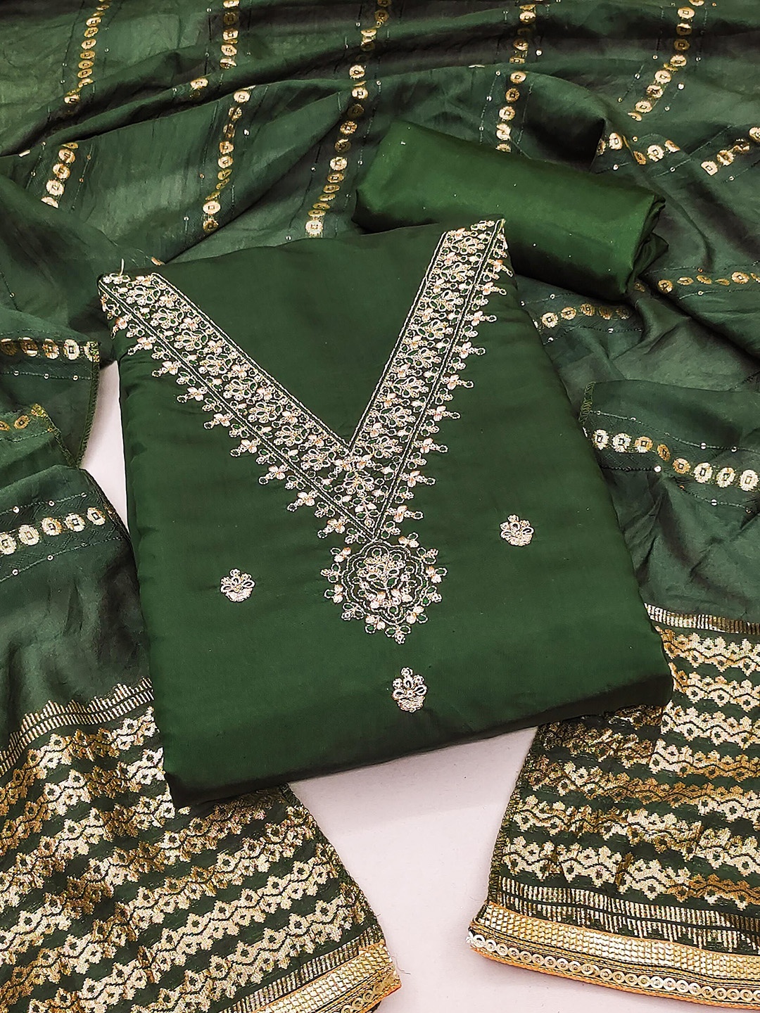 SHADOW & SAINING Floral Embroidered Sequinned Chanderi Cotton Unstitched Dress Material, Green
SHADOW & SAINING Floral Embroidered Sequinned Chanderi Cotton Unstitched Dress Material, Green