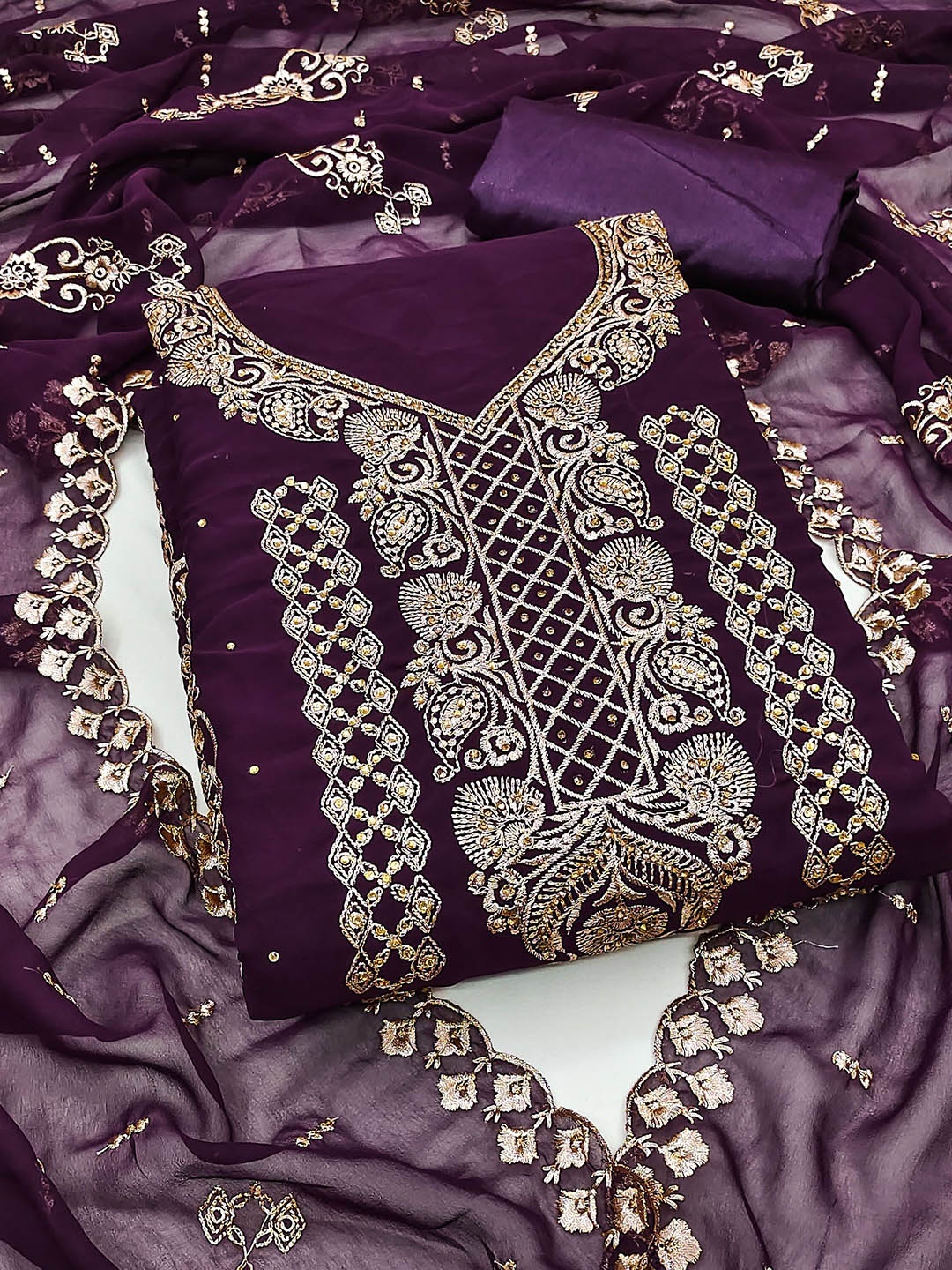SHADOW & SAINING Embroidered Zari Silk Georgette Unstitched Dress Material, Purple
SHADOW & SAINING Embroidered Zari Silk Georgette Unstitched Dress Material, Purple