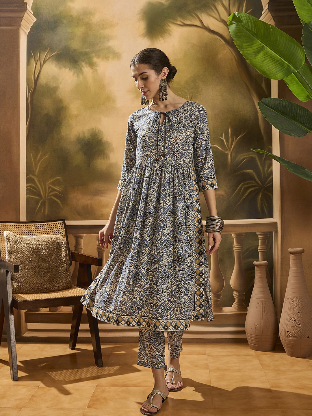 Sangria Floral Printed Plated Tie-Up Neck Pure Cotton A-Line Kurta With Trousers, Blue
Sangria Floral Printed Plated Tie-Up Neck Pure Cotton A-Line Kurta With Trousers, Blue