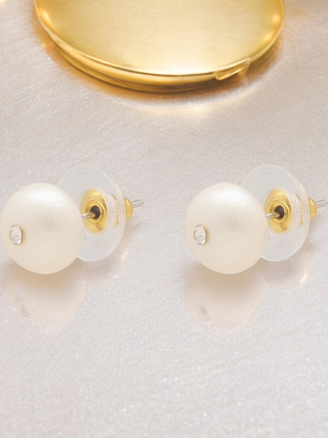 Sri Jagdamba Pearls Dealer Gold Plated Cubic Zirconia Studded Contemporary Studs, White
Sri Jagdamba Pearls Dealer Gold Plated Cubic Zirconia Studded Contemporary Studs, White