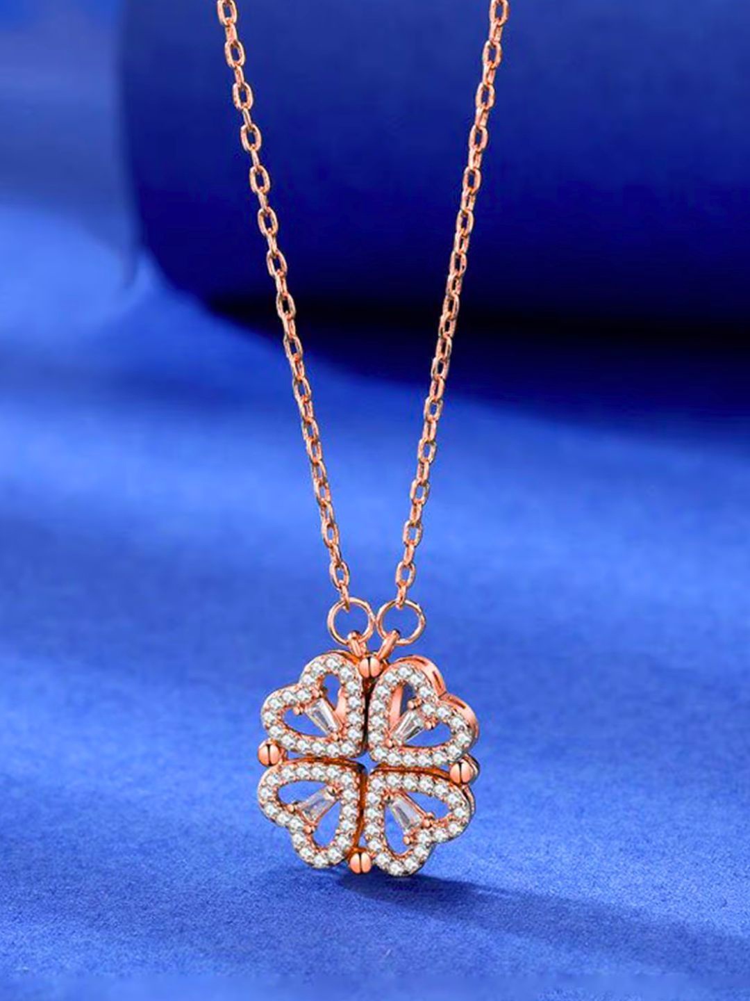 DressBerry Rose Gold-Plated CZ Studded Four Hearts Openable Magnet Pendant with Chain
DressBerry Rose Gold-Plated CZ Studded Four Hearts Openable Magnet Pendant with Chain