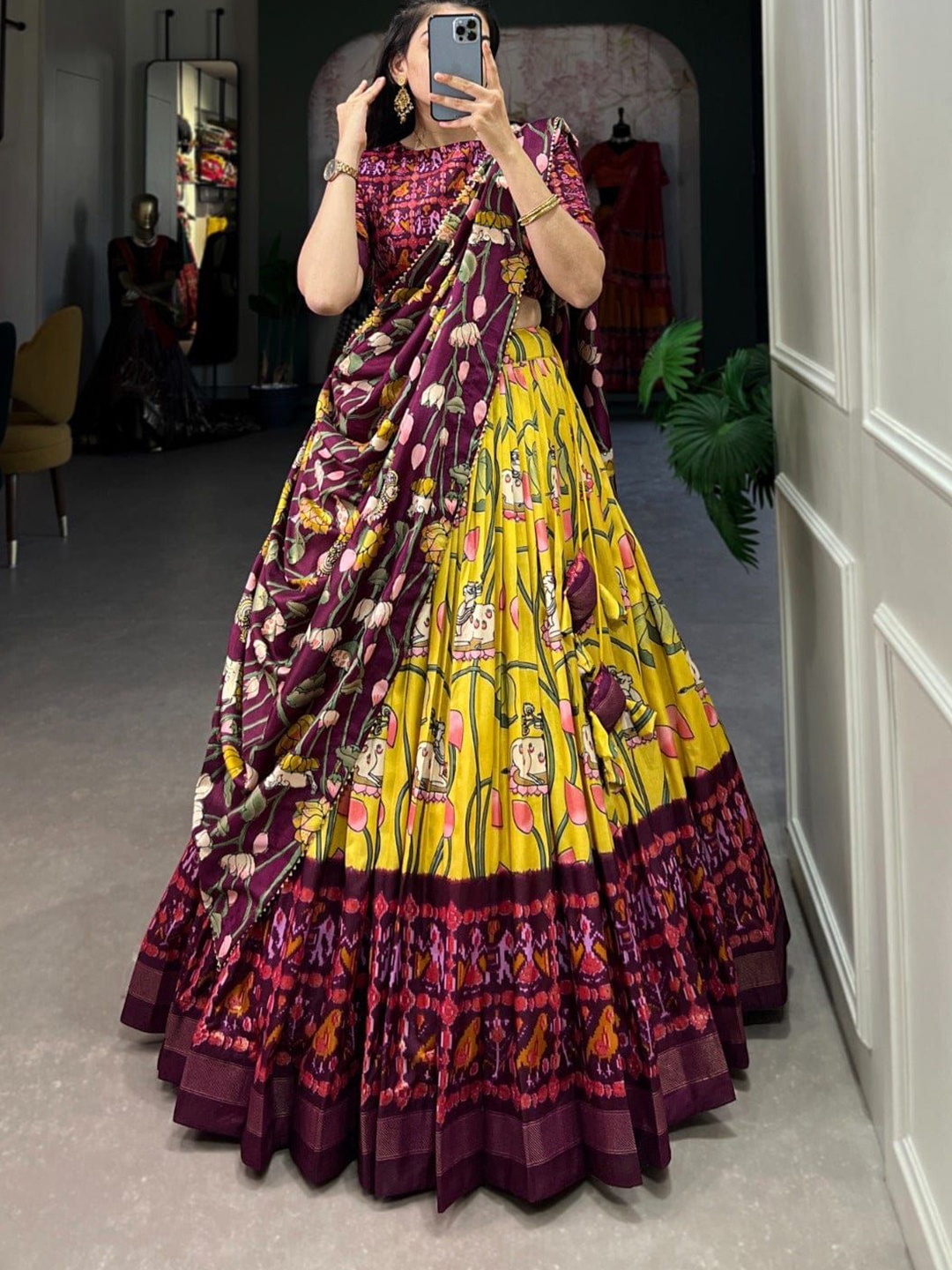 RADHVI BIZ Ethnic Motifs Printed Kalamkari Lehenga With Semi-Stitched Blouse & Dupatta, Yellow
RADHVI BIZ Ethnic Motifs Printed Kalamkari Lehenga With Semi-Stitched Blouse & Dupatta, Yellow