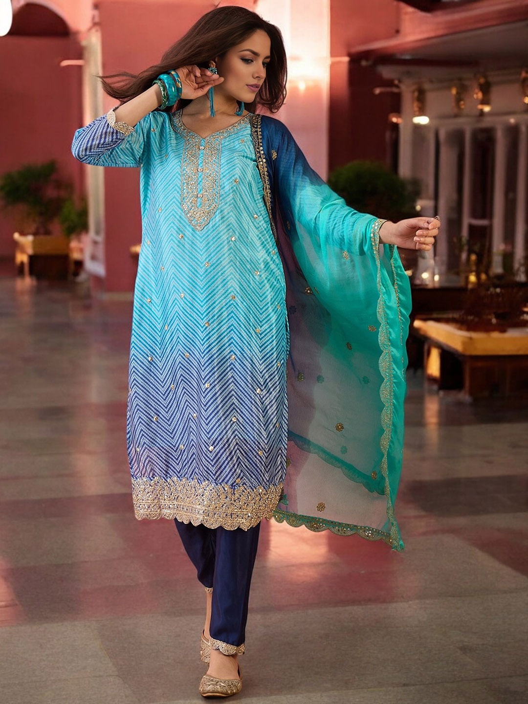 Blissta Bandhani Printed V-Neck Sequinned Straight Kurta With Trousers & Dupatta, Blue
Blissta Bandhani Printed V-Neck Sequinned Straight Kurta With Trousers & Dupatta, Blue